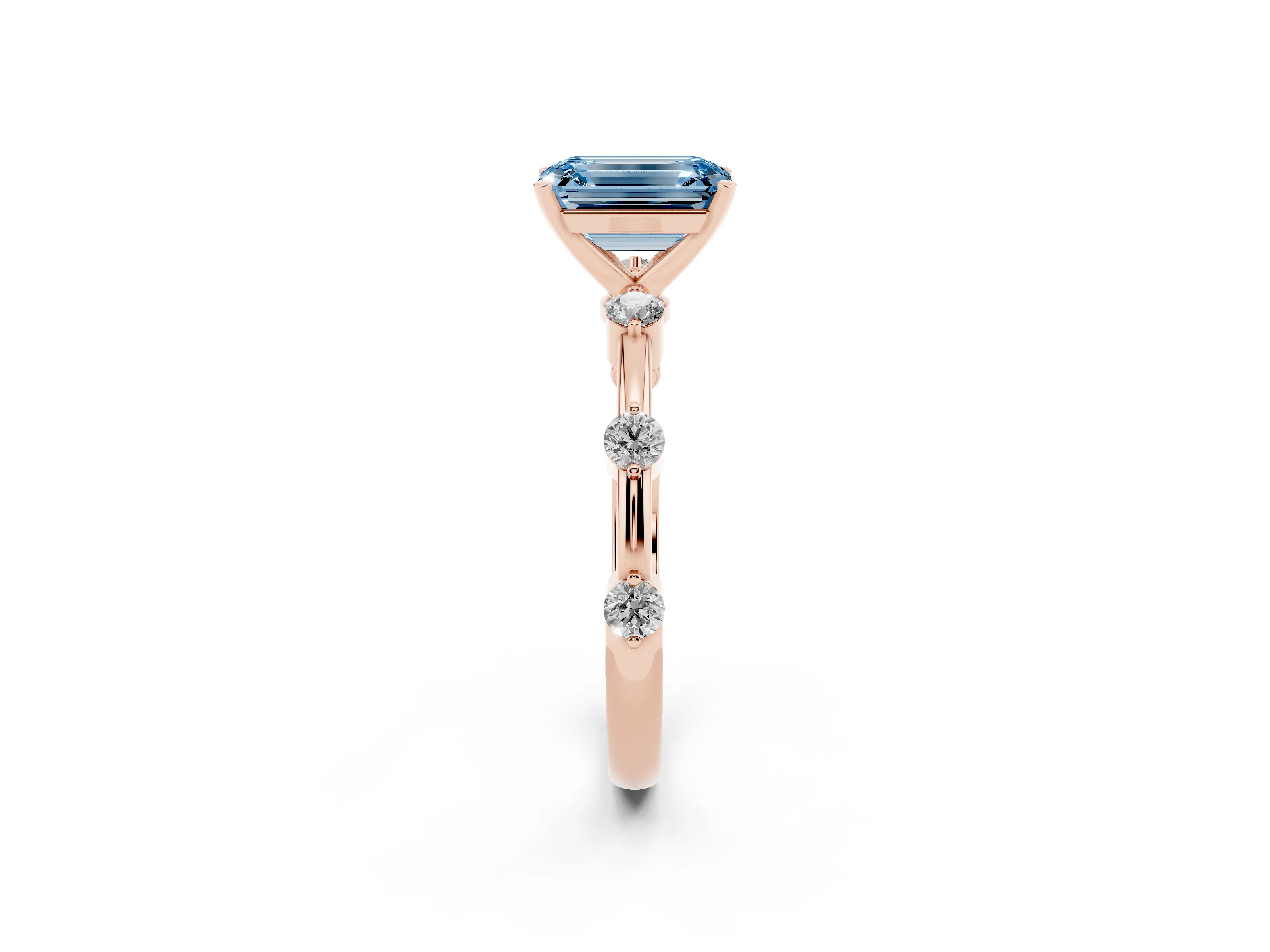 Fancy Blue Emerald Cut Diamond Solitaire Ring Set in Rose gold with Bezel Set Side Stones and Prong Setting