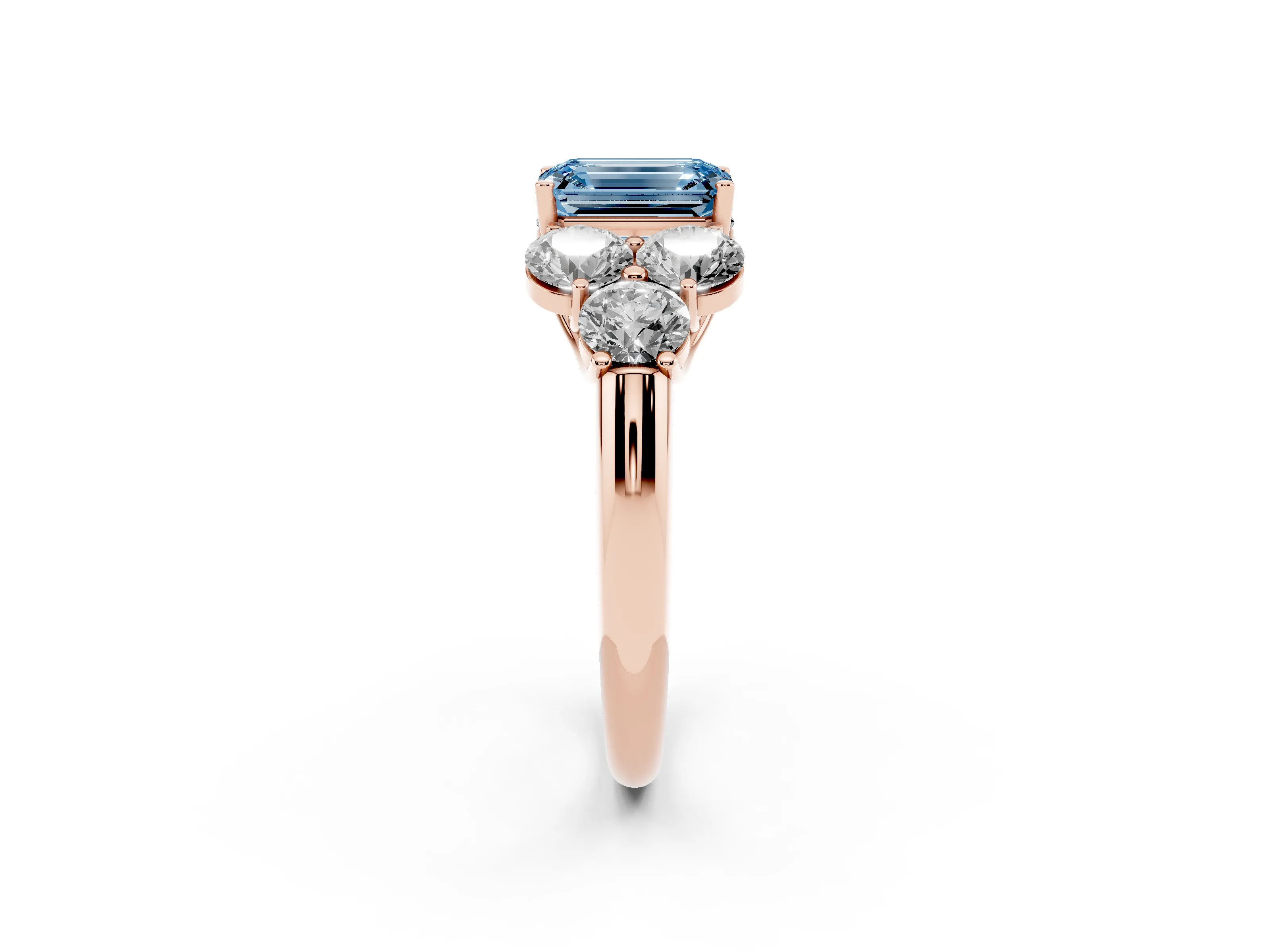 Fancy Blue Emerald Cut Diamond Cluster Ring Set in Rose gold with Round Accent Stones and Prong Setting on a Plain Band