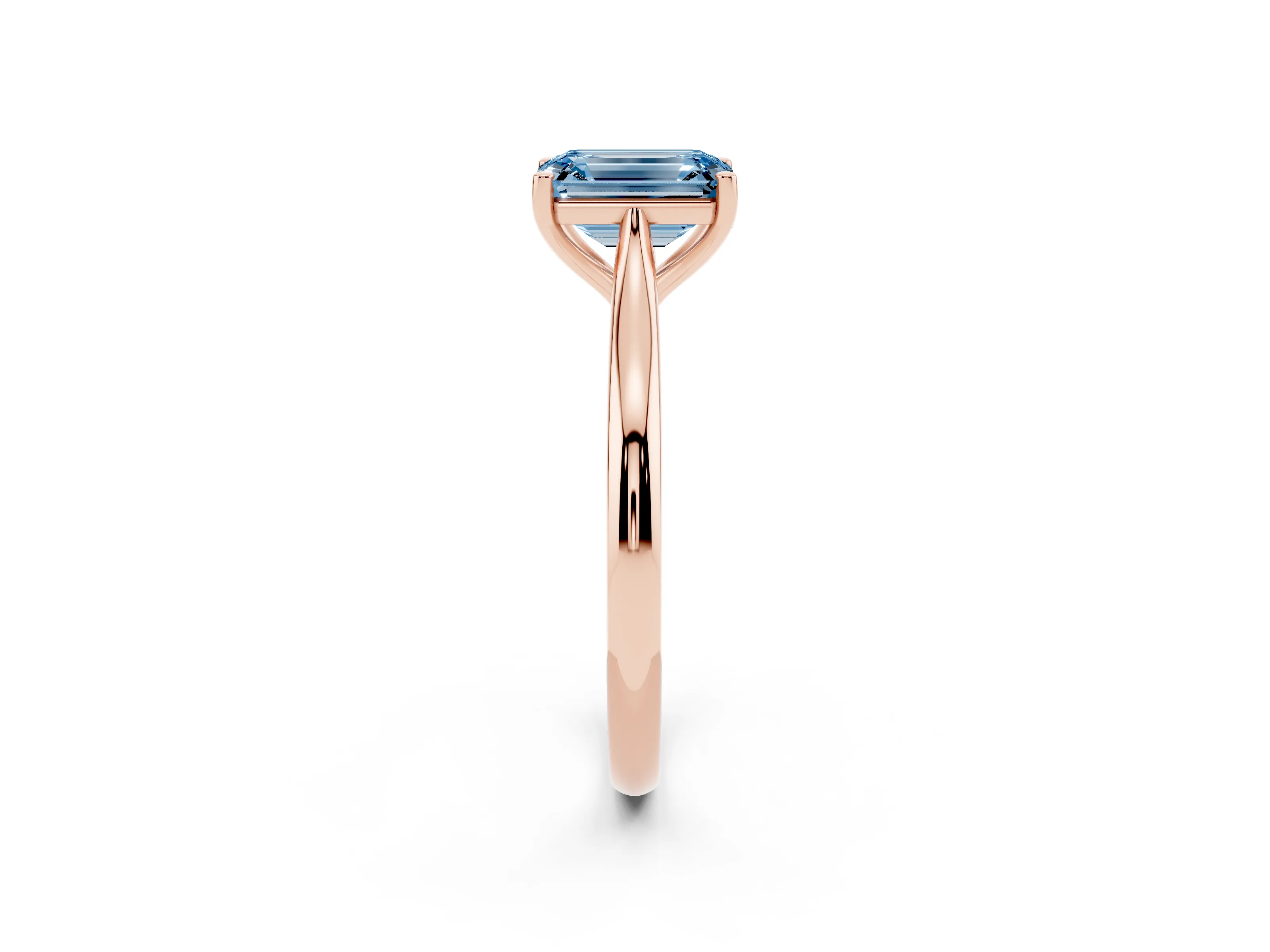 Fancy Blue Emerald Cut Diamond Solitaire Ring Set in Rose gold with Cathedral Band and Prong Setting