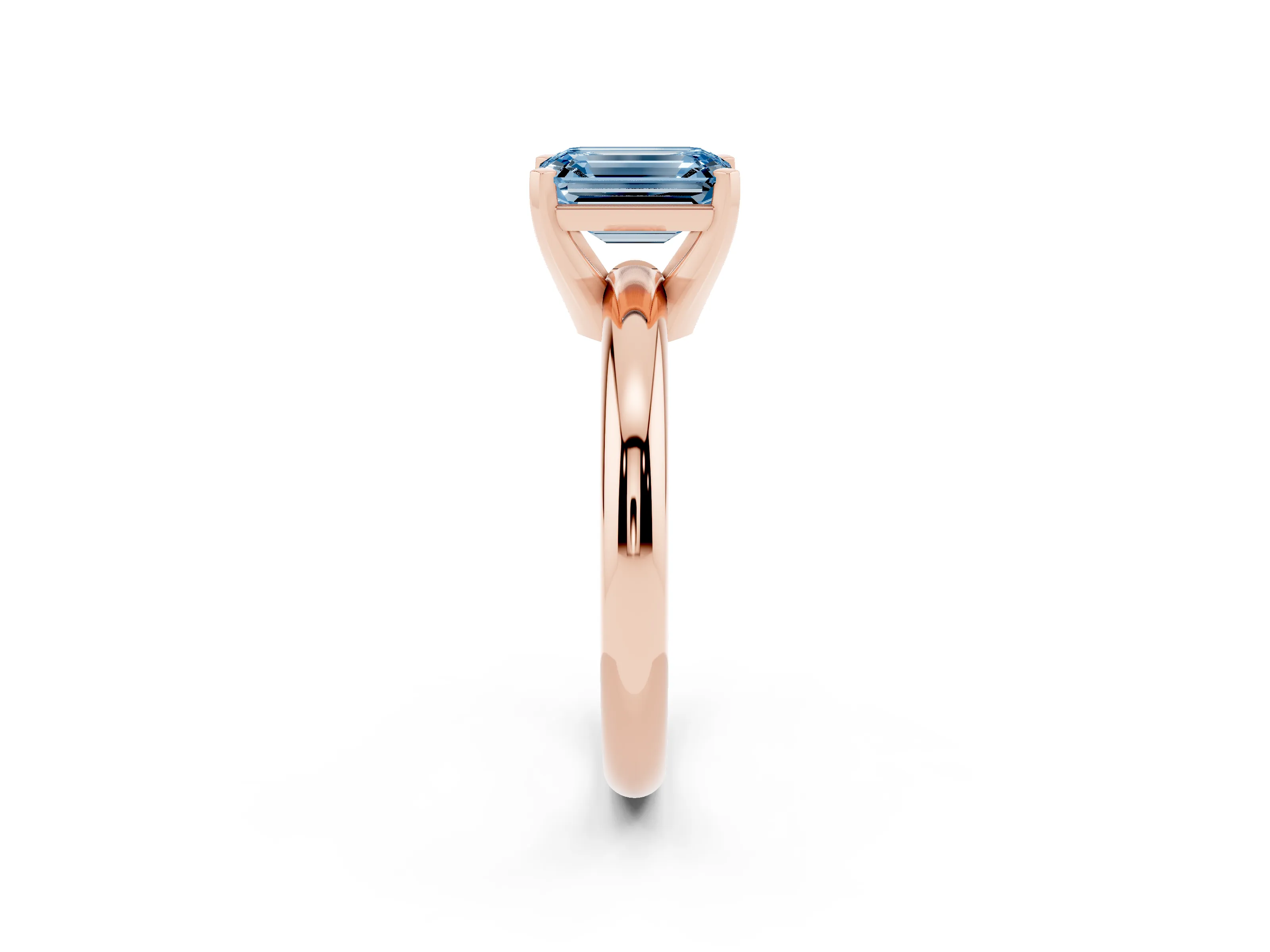 Fancy Blue Emerald Cut Diamond Solitaire Engagement Ring Set in Rose gold with Round Band and Prong Setting