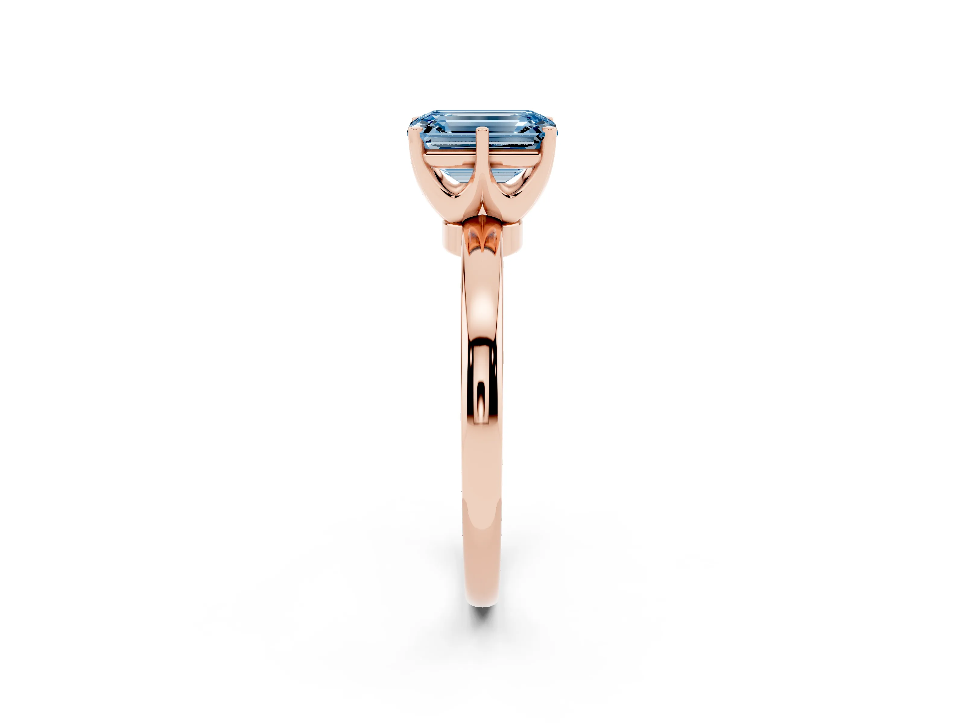 Fancy Blue Emerald Cut Diamond Solitaire Ring Set in Rose gold with Raised Prong Setting on a Classic Band
