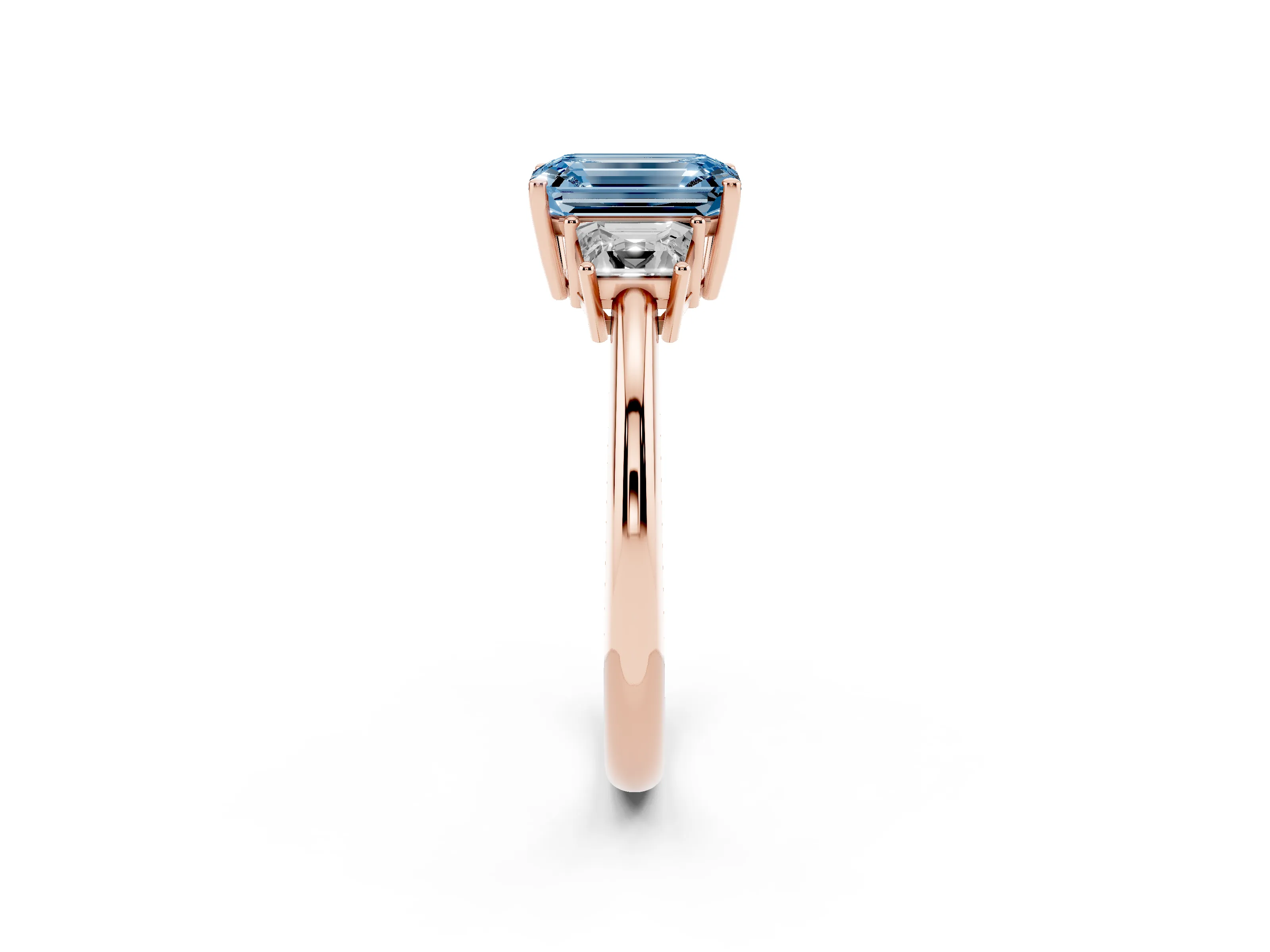 Fancy Blue Emerald Cut Diamond Three-Stone Ring Set in Rose gold with Trapezoid Side Stones and Prong Setting