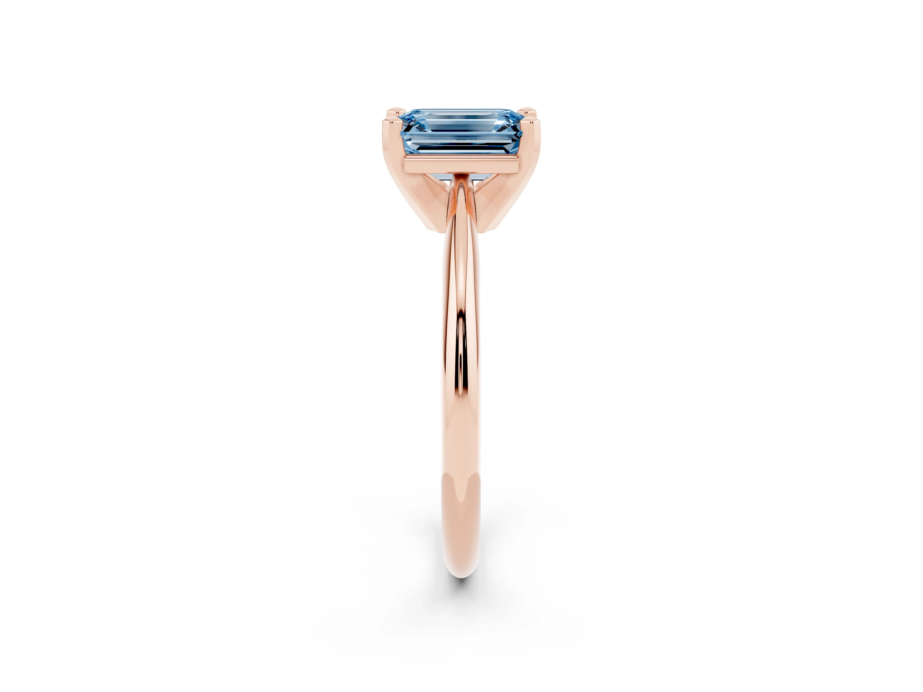 Fancy Blue Emerald Cut Diamond Solitaire Ring Set in Rose gold with Prong Setting on a Plain Round Band