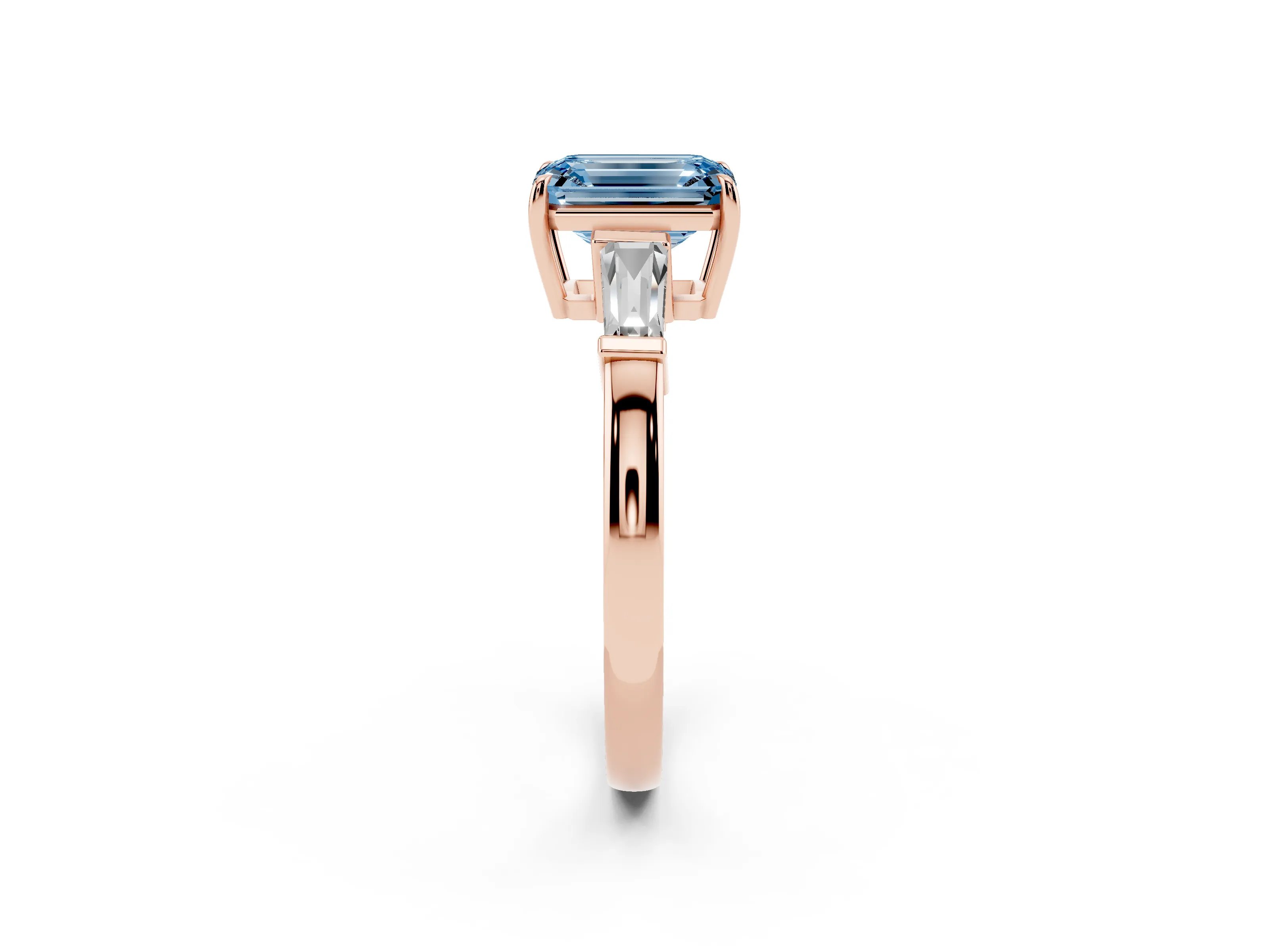 Fancy Blue Emerald Cut Diamond Three-Stone Ring Set in Rose gold with Tapered Baguette Side Stones and Prong Setting
