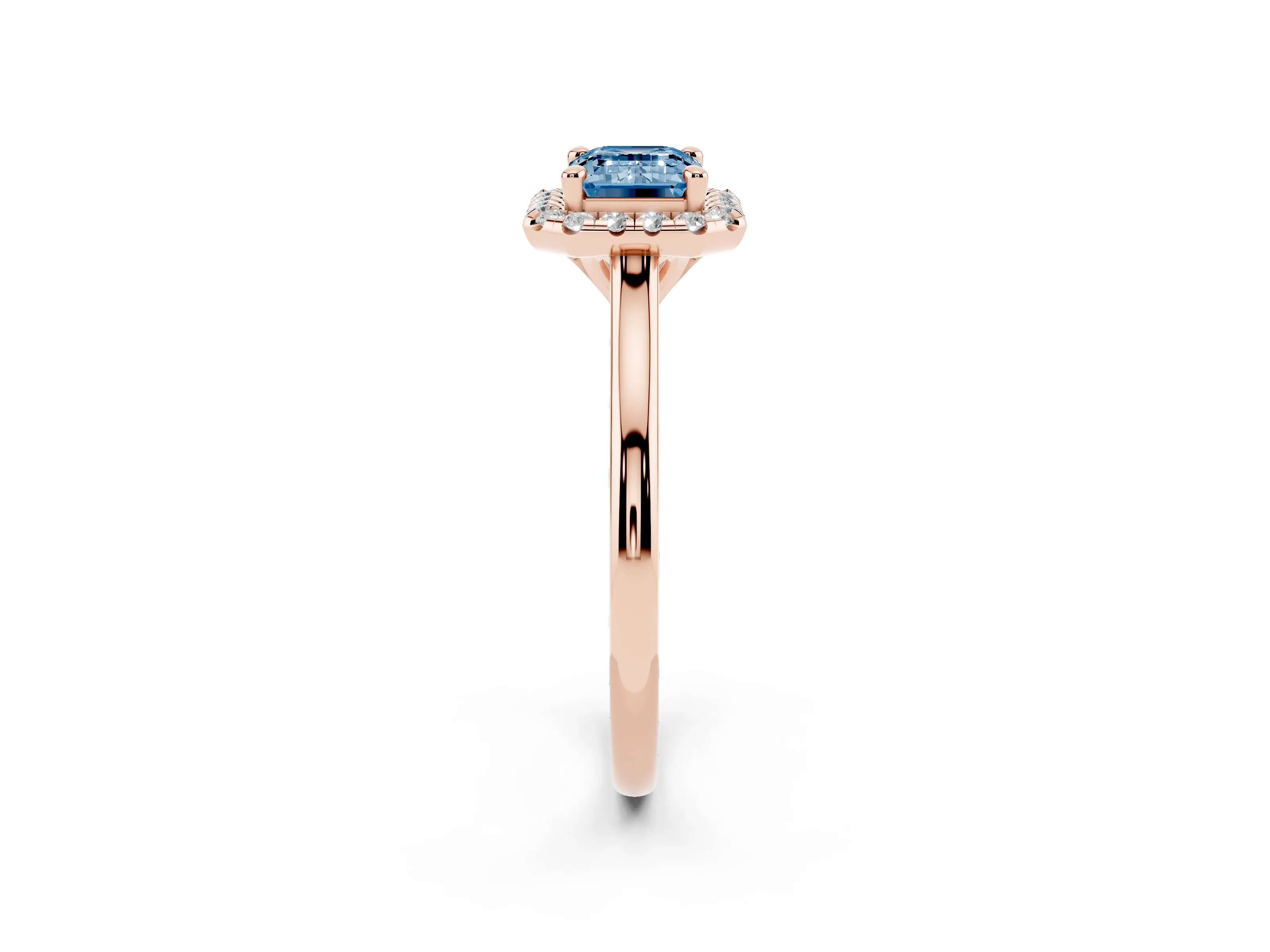 Fancy Blue Emerald Cut Diamond Halo Engagement Ring Set in Rose gold with Pavé Band and Rising Shoulders