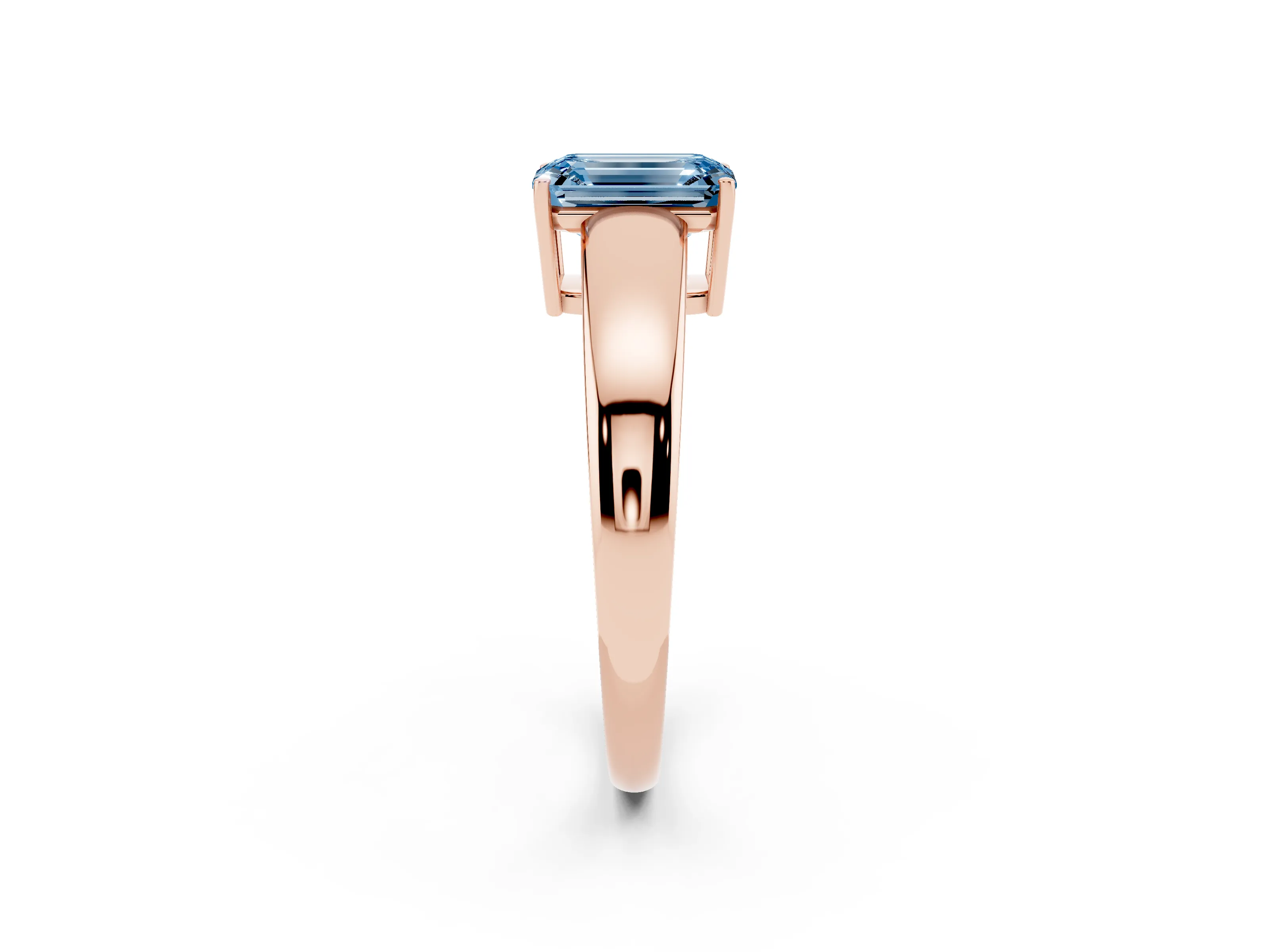 Fancy Blue Emerald Cut Diamond Solitaire Ring Set in Rose gold with Tapered Band and Prong Setting