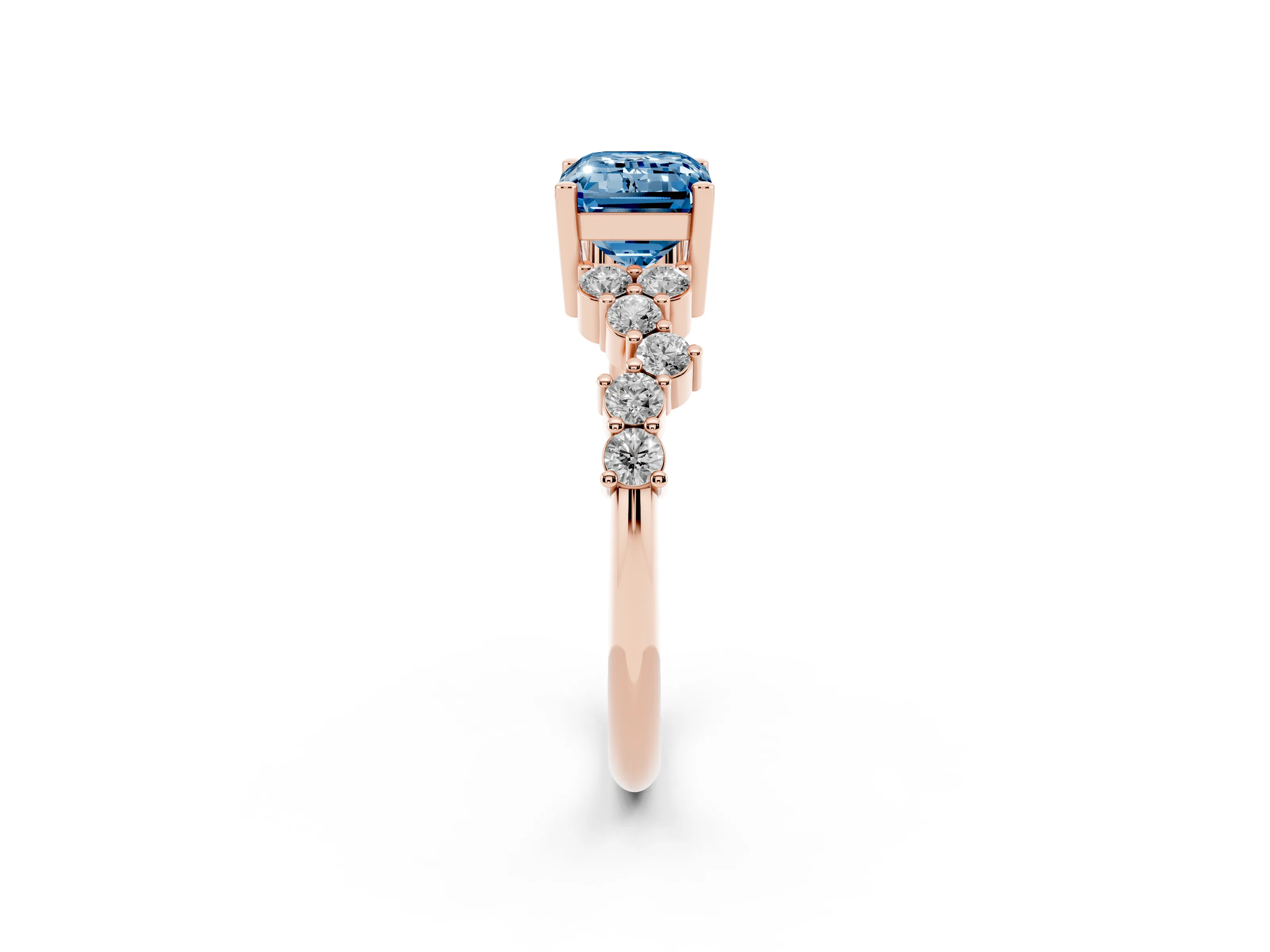 Fancy Blue Emerald Cut Diamond Ring Set in Rose gold with Scattered Round Accents