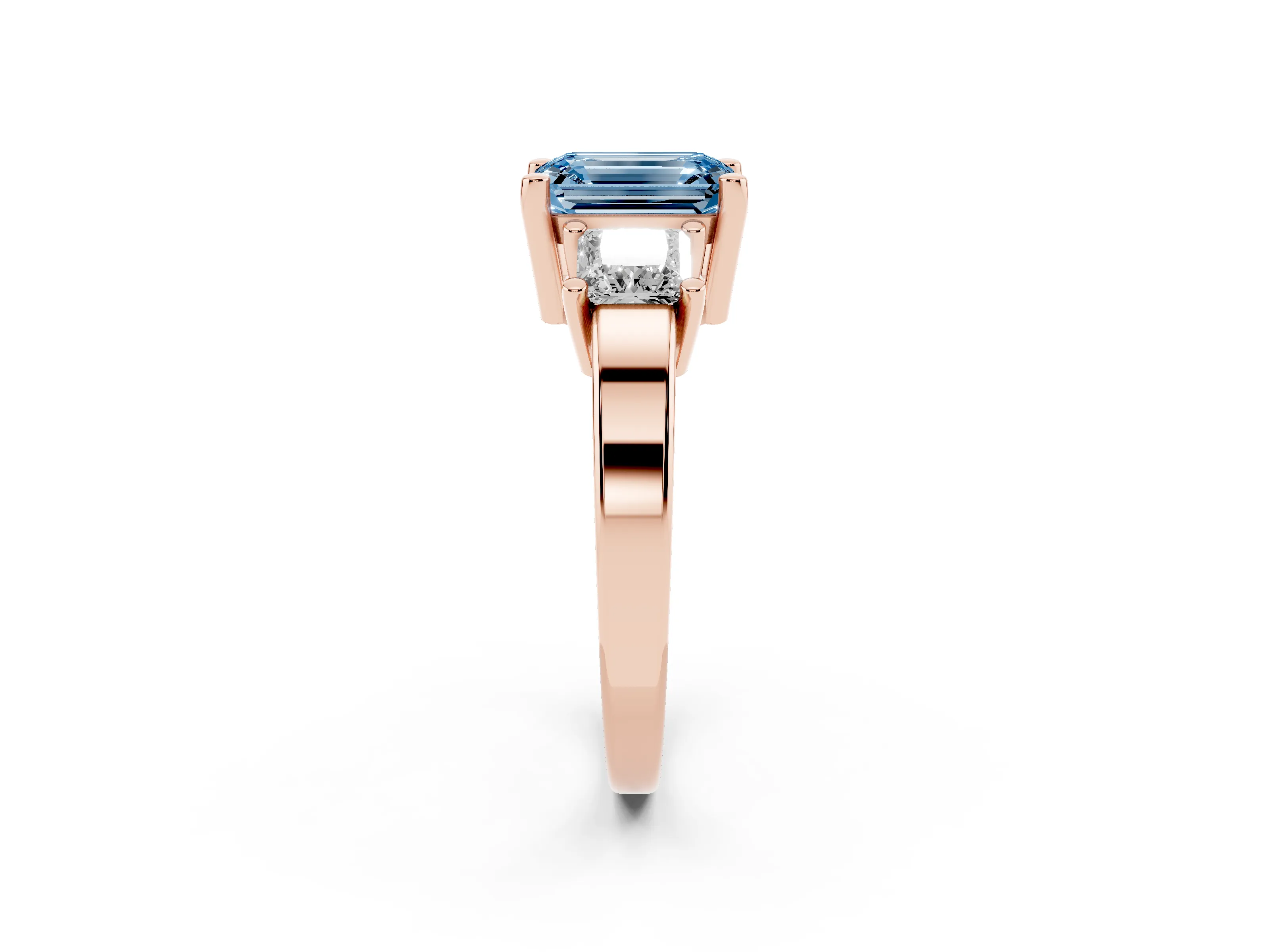 Fancy Blue Three-Stone Emerald Cut Diamond Solitaire Ring Set in Rose gold with Prong Setting