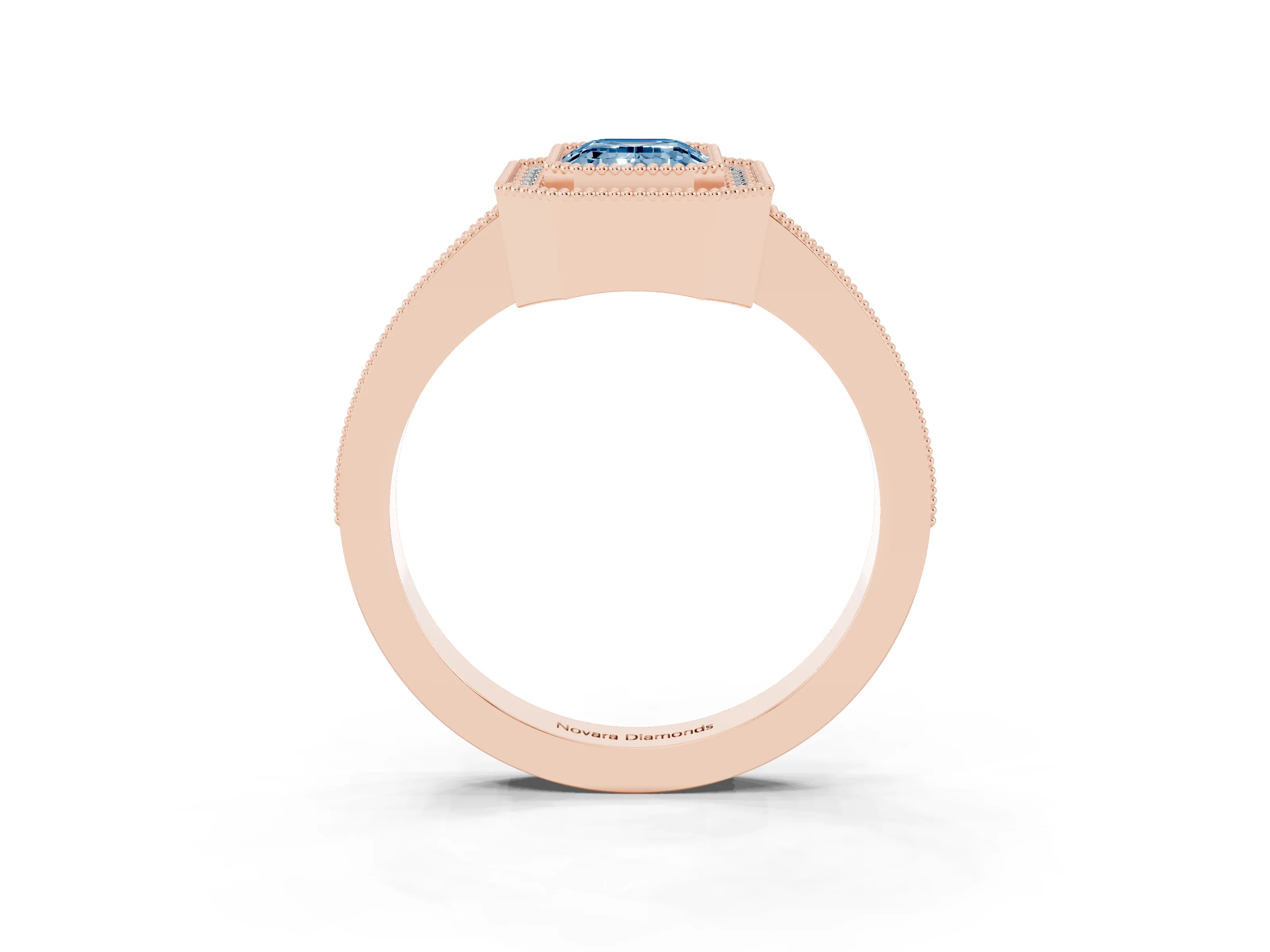 Fancy Blue Emerald Cut Diamond Halo Engagement Ring Set in Rose gold with Pavé Band and Round Halo Stones
