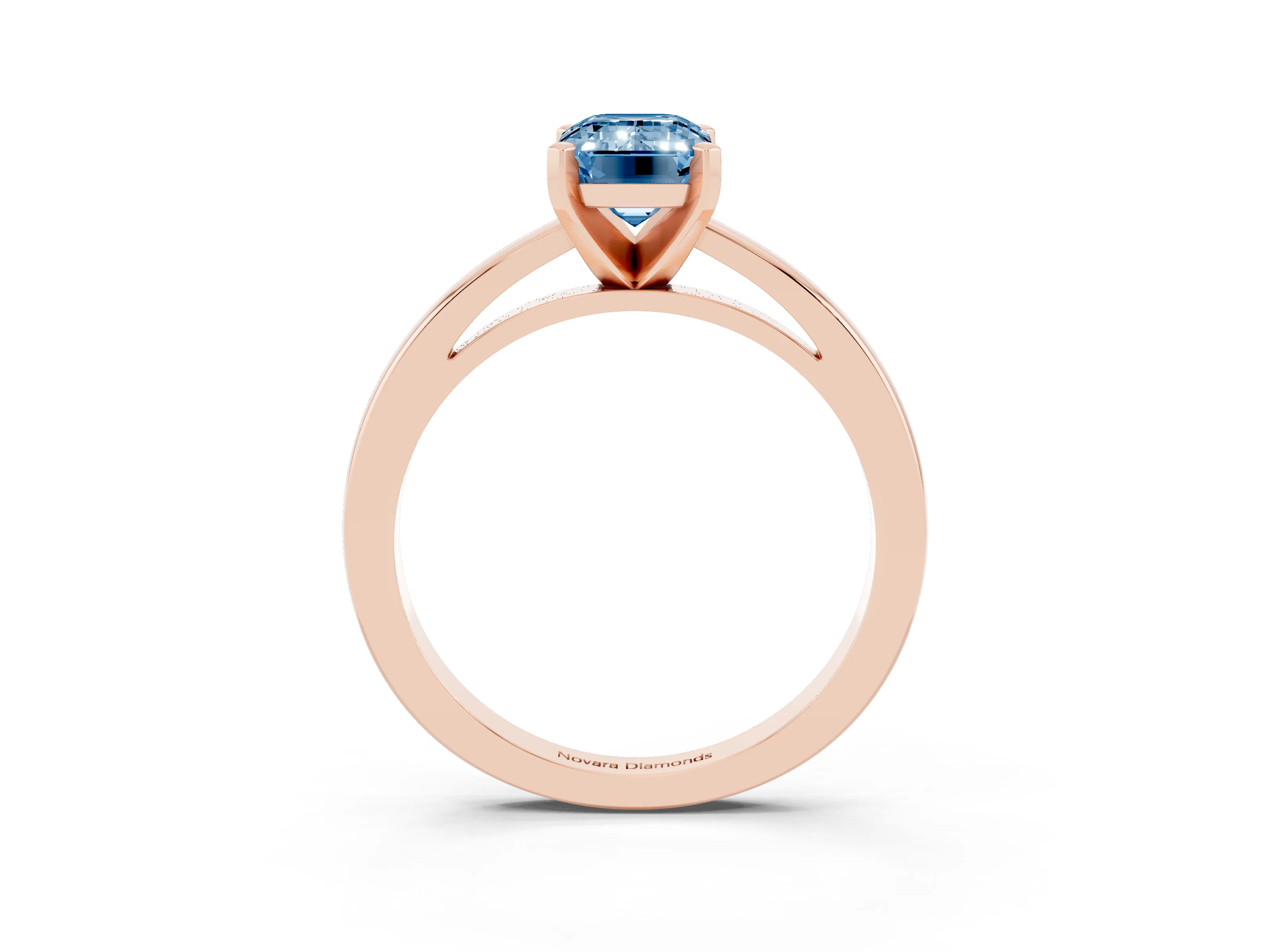Fancy Blue Emerald Cut Diamond Solitaire Engagement Ring Set in Rose gold with Prong Setting on a Classic Band