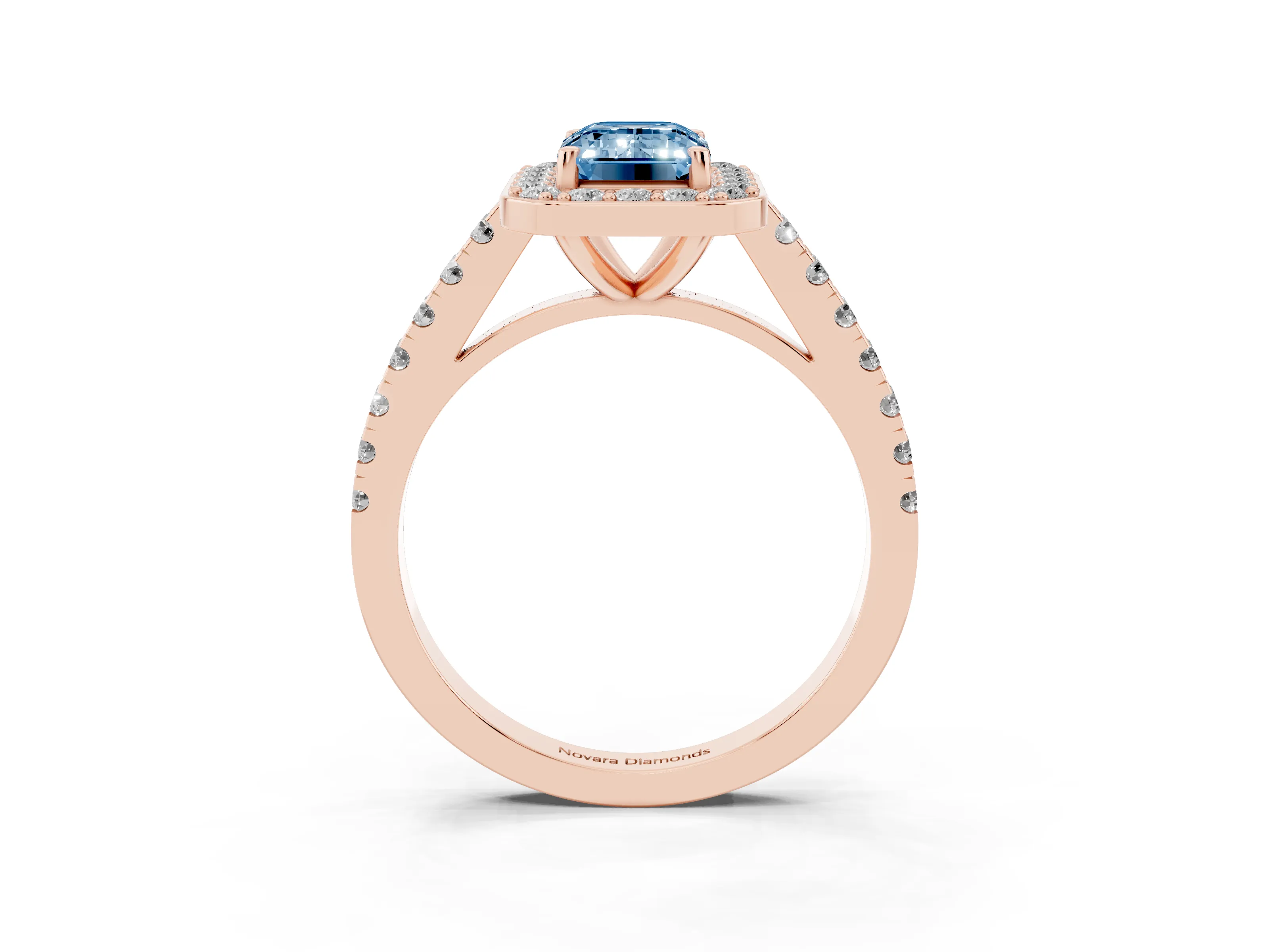 Fancy Blue Emerald Cut Diamond Halo Ring Set in Rose gold with Round Pavé Split Shank and Prong Setting