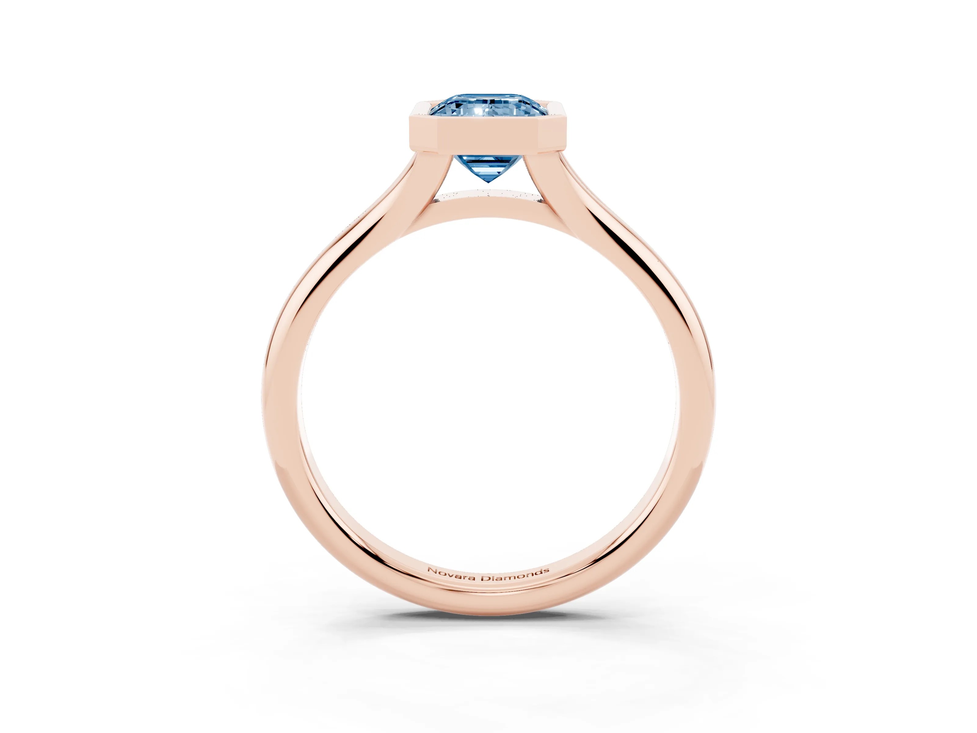 Fancy Blue Bezel Set Emerald Cut Diamond Solitaire Ring Set in Rose gold with Smooth Band