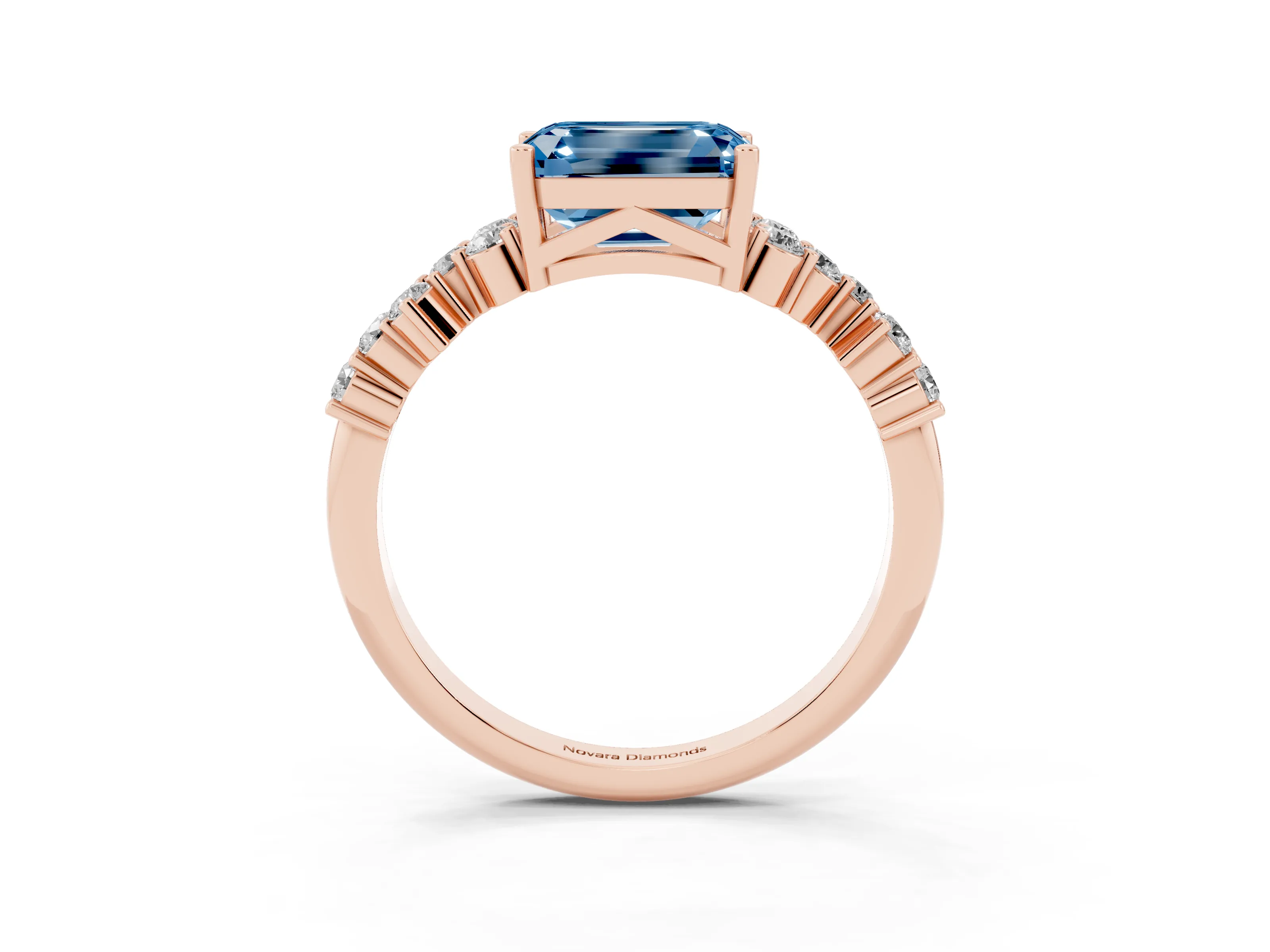 Fancy Blue Emerald Cut Diamond Ring Set in Rose gold with Scattered Round Accents