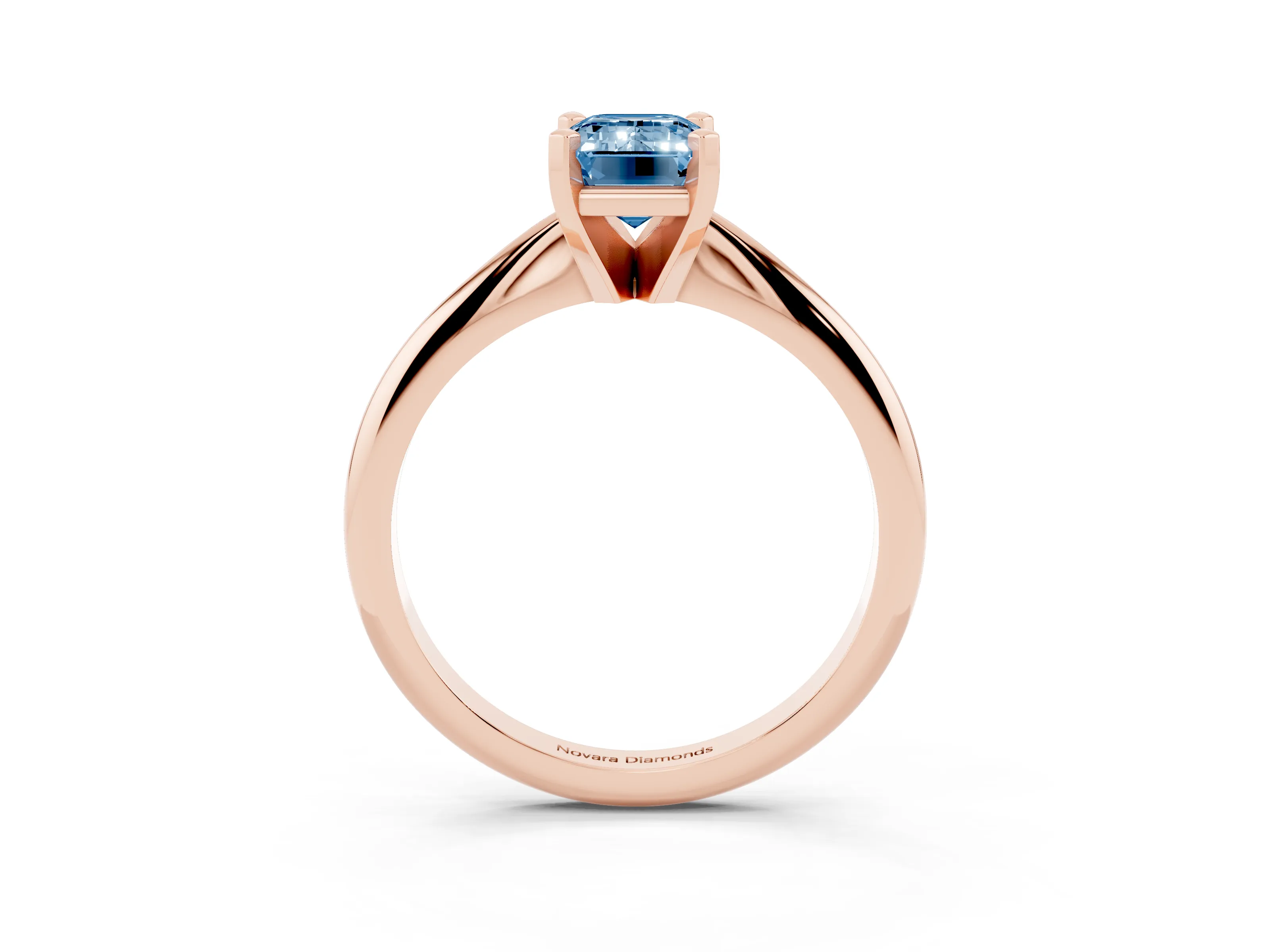 Fancy Blue Emerald Cut Diamond Solitaire Ring Set in Rose gold with Prong Setting on a Plain Round Band