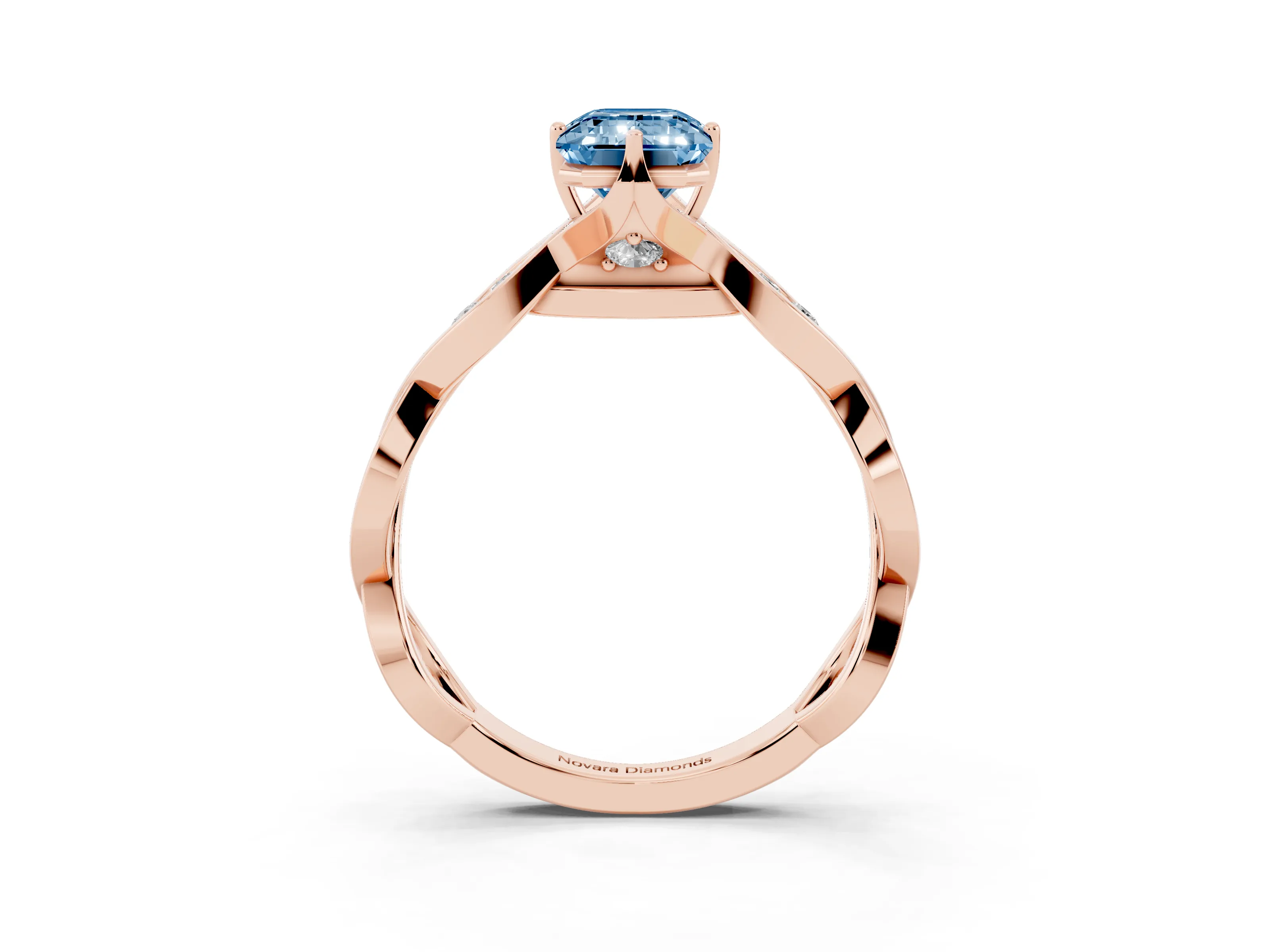 Fancy Blue Emerald Cut Diamond Twist Band Solitaire Ring Set in Rose gold with Leaf Prong Setting and Accent Stones