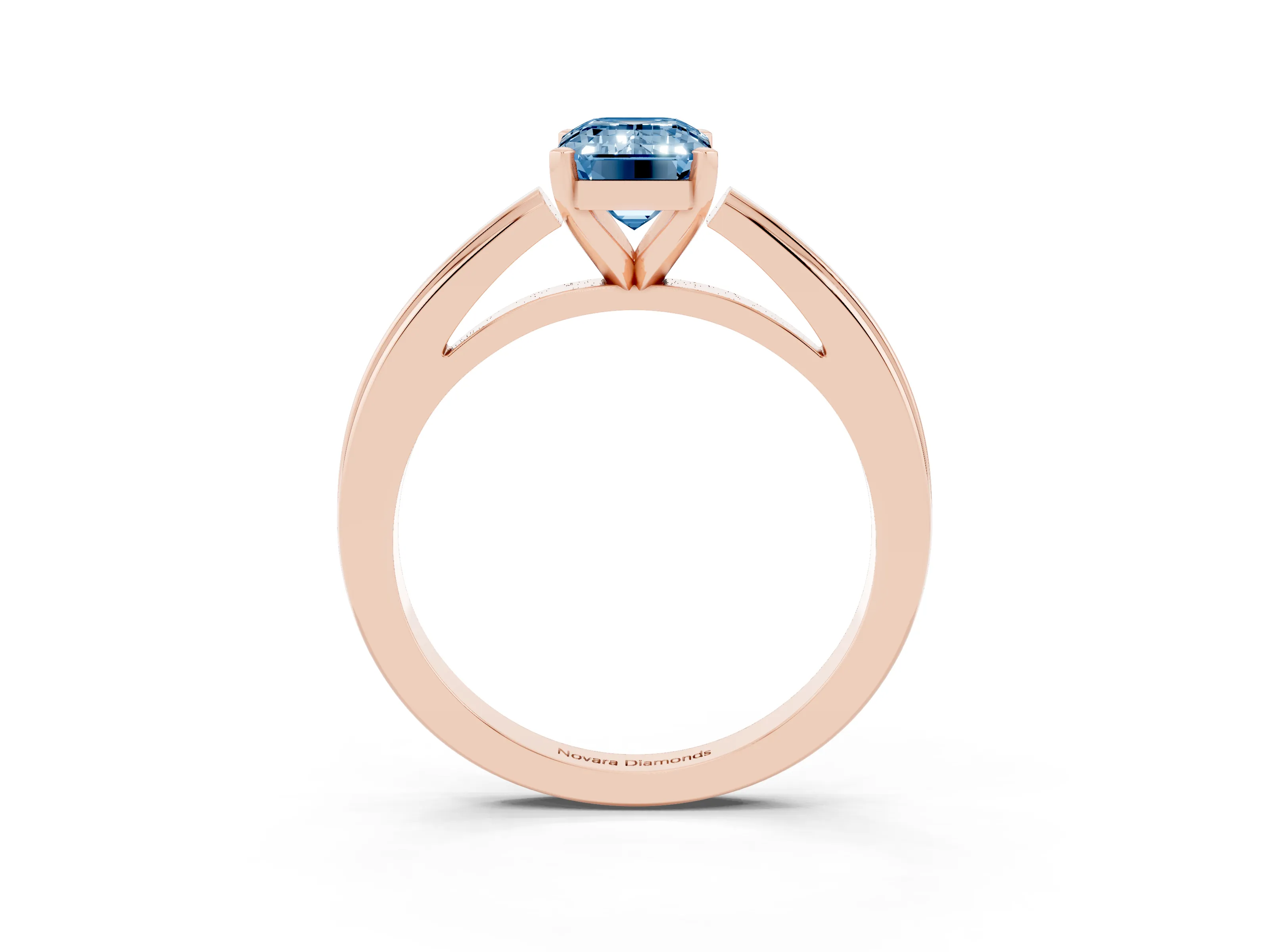 Fancy Blue Emerald Cut Diamond Solitaire Ring Set in Rose gold with Prong Setting and Classic Band