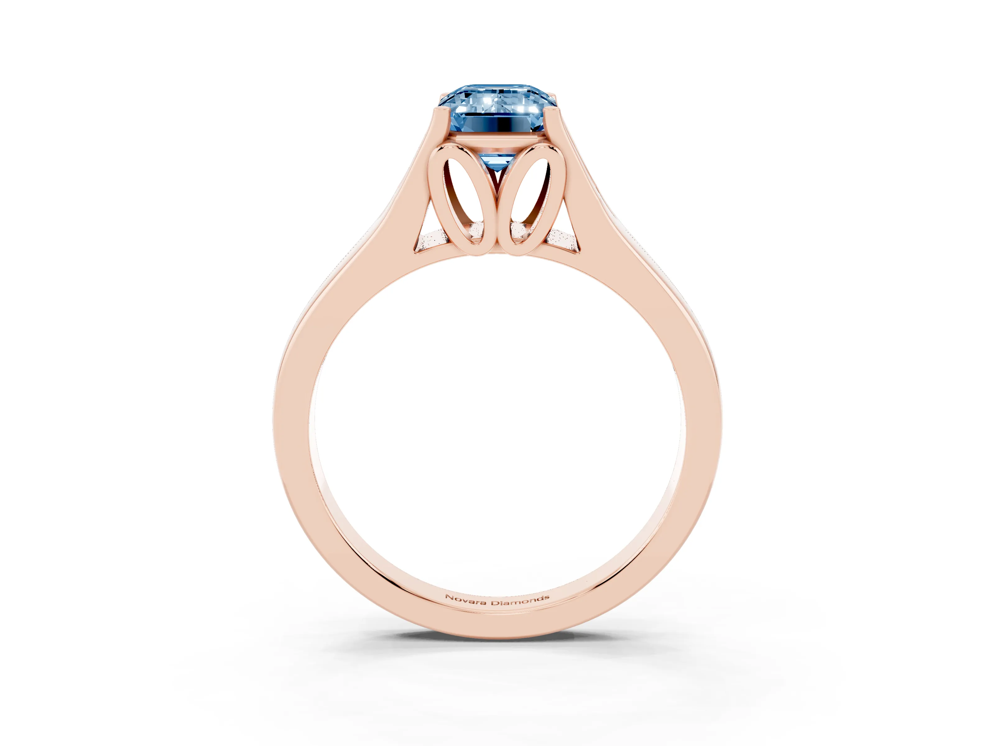 Fancy Blue Emerald Cut Diamond Solitaire Ring Set in Rose gold with Arched Cathedral Band and Prong Setting
