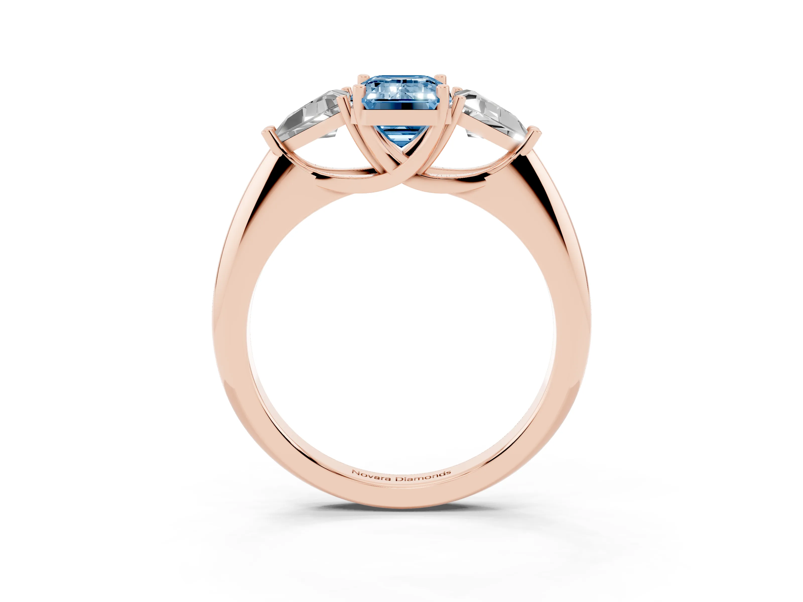 Fancy Blue Emerald Cut Diamond Three-Stone Engagement Ring Set in Rose gold with Trillion Side Stones
