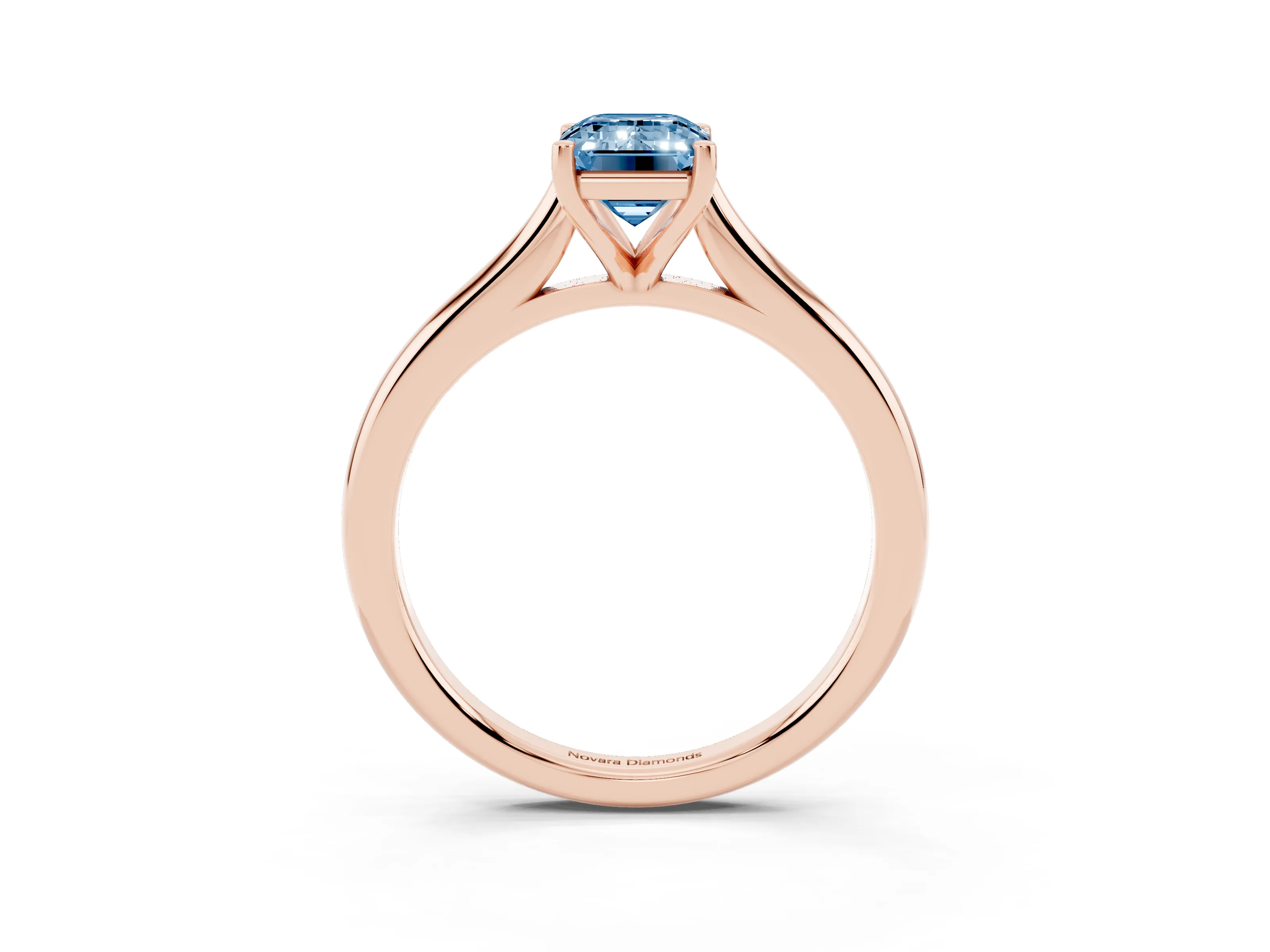 Fancy Blue Emerald Cut Diamond Solitaire Ring Set in Rose gold with Cathedral Band and Prong Setting