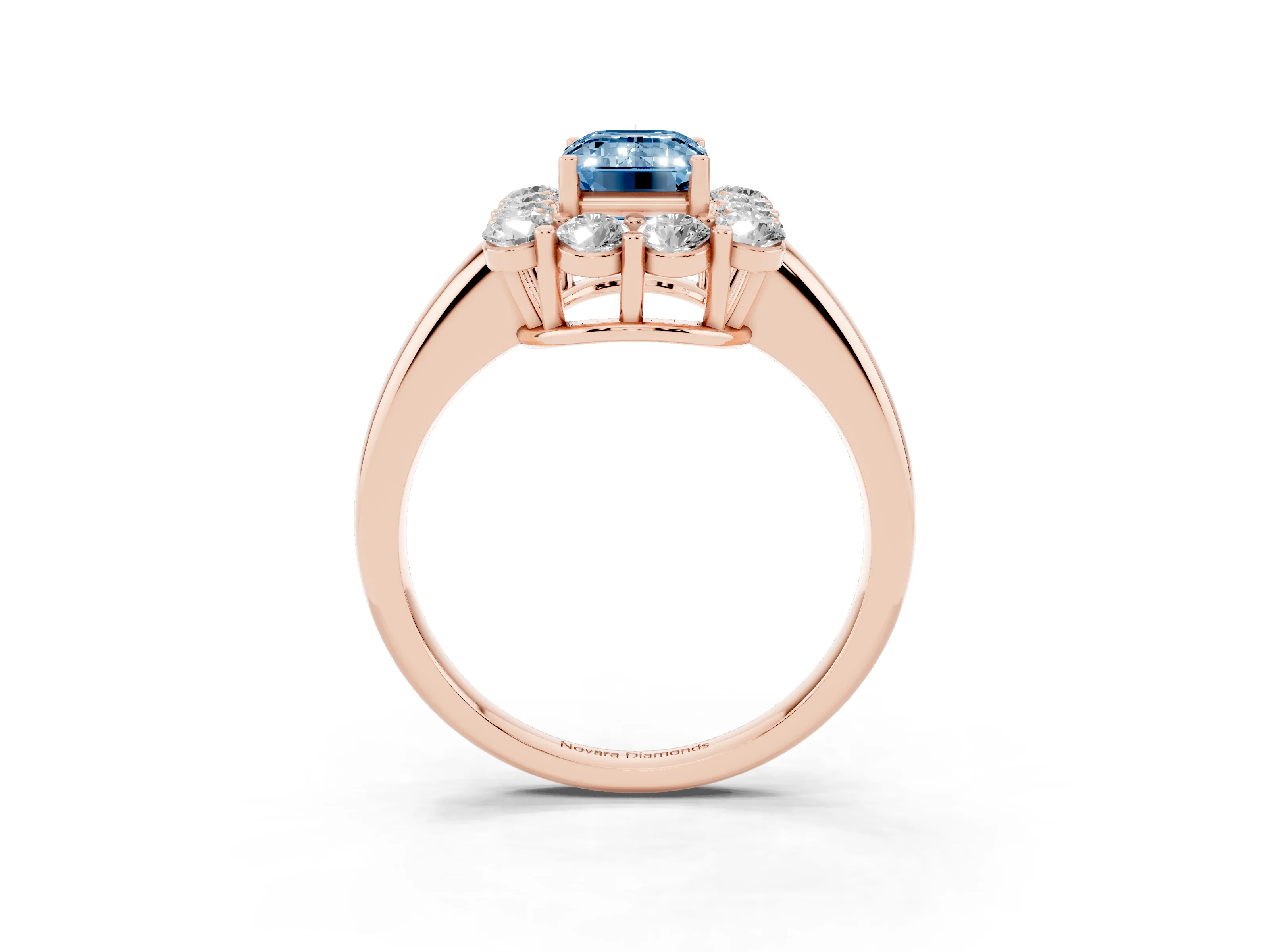 Fancy Blue Emerald Cut Diamond Halo Cluster Engagement Ring Set in Rose gold with Polished Band and Prong Setting