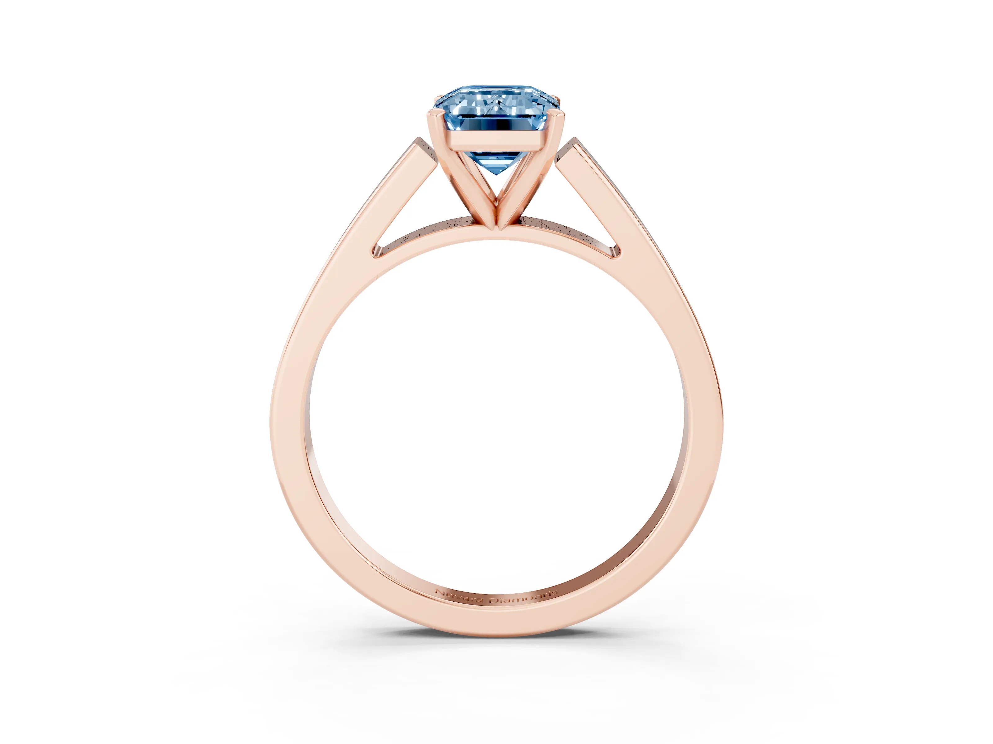 Fancy Blue Emerald Cut Diamond Solitaire Engagement Ring Set in Rose gold with Prong Setting and Tapered Band