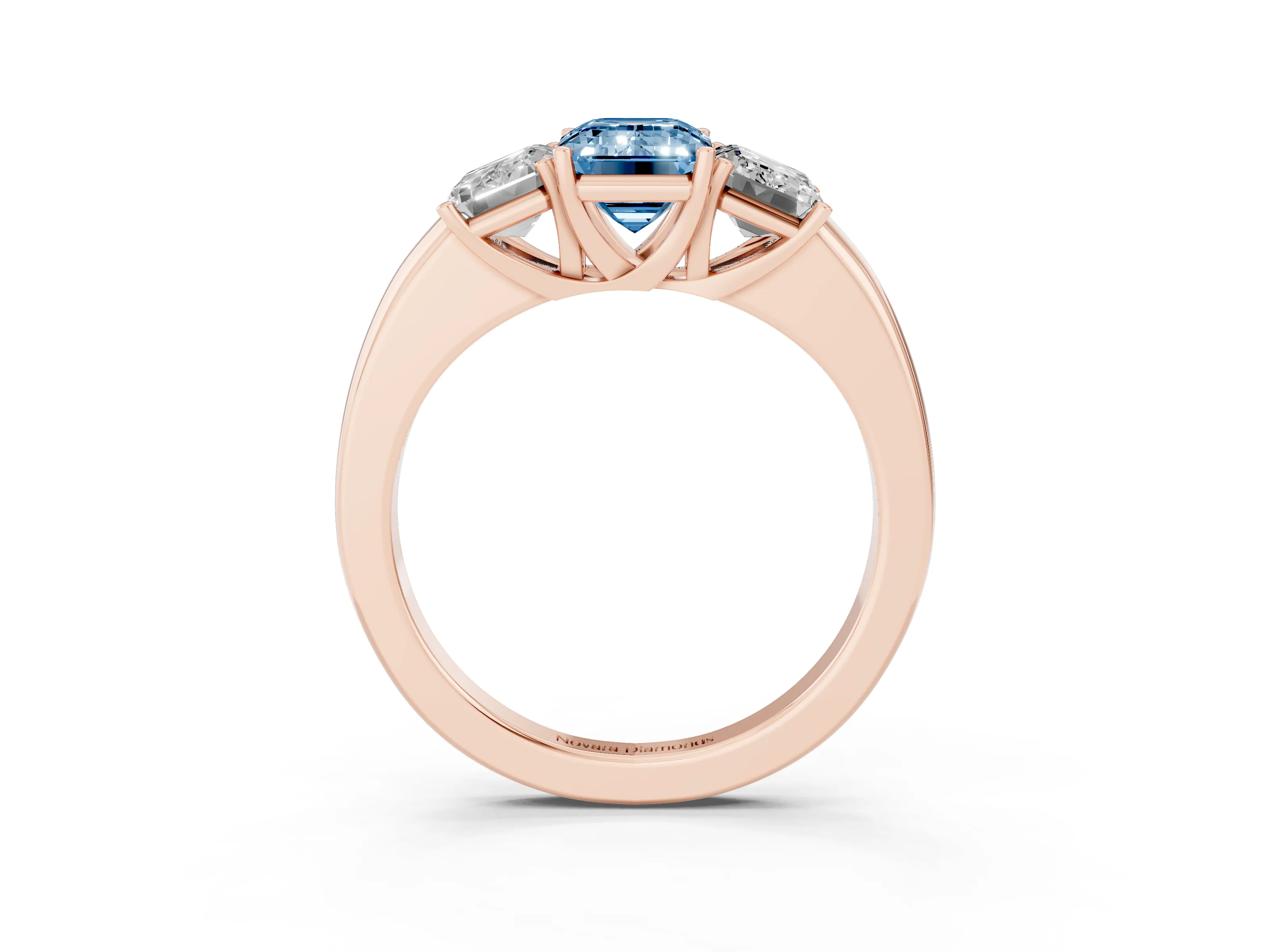 Fancy Blue Emerald Cut Diamond Three-Stone Ring Set in Rose gold with Bold Center and Classic Band