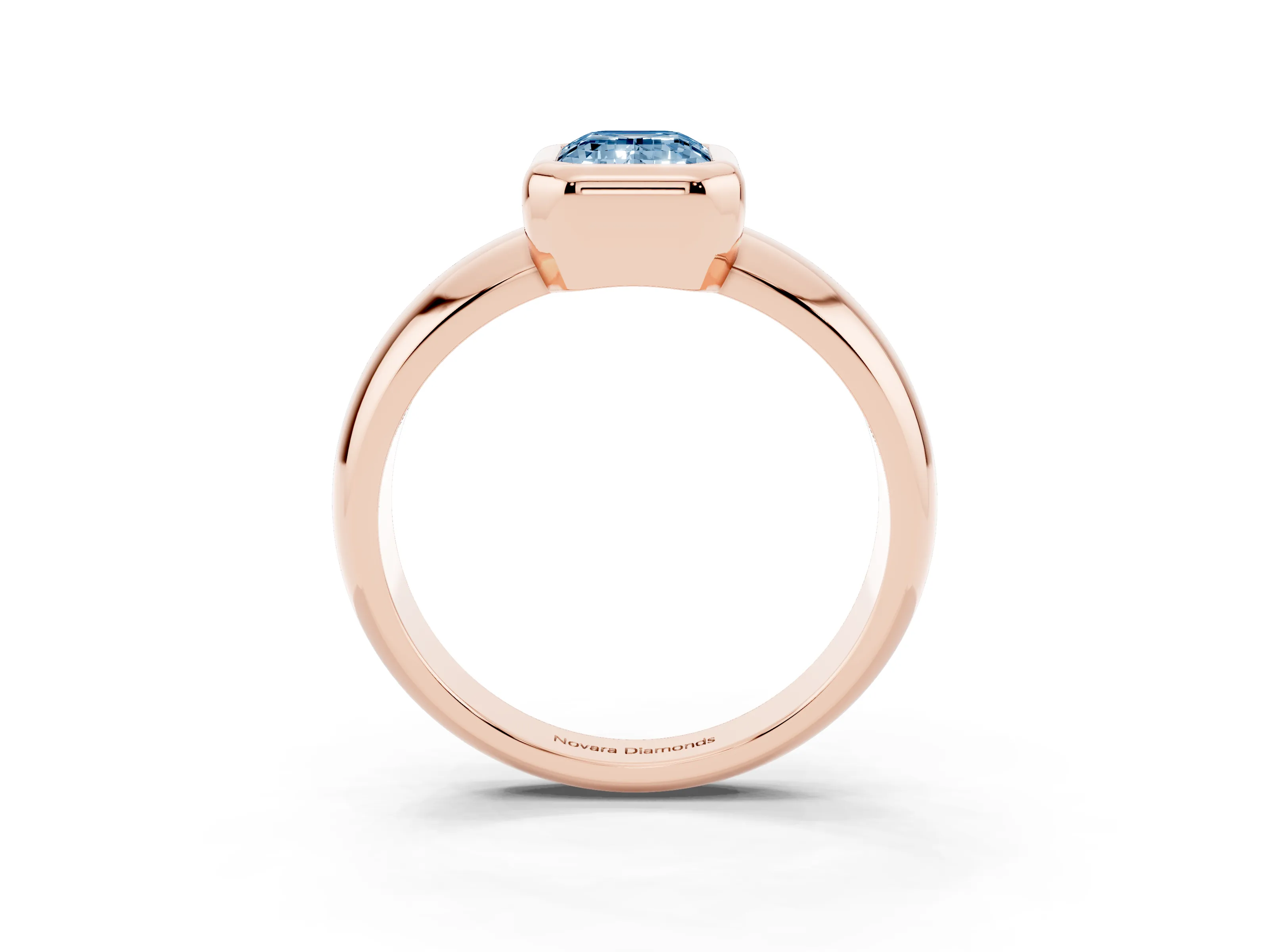 Fancy Blue Bezel Set Emerald Cut Diamond Solitaire Ring Set in Rose gold with Wide Band