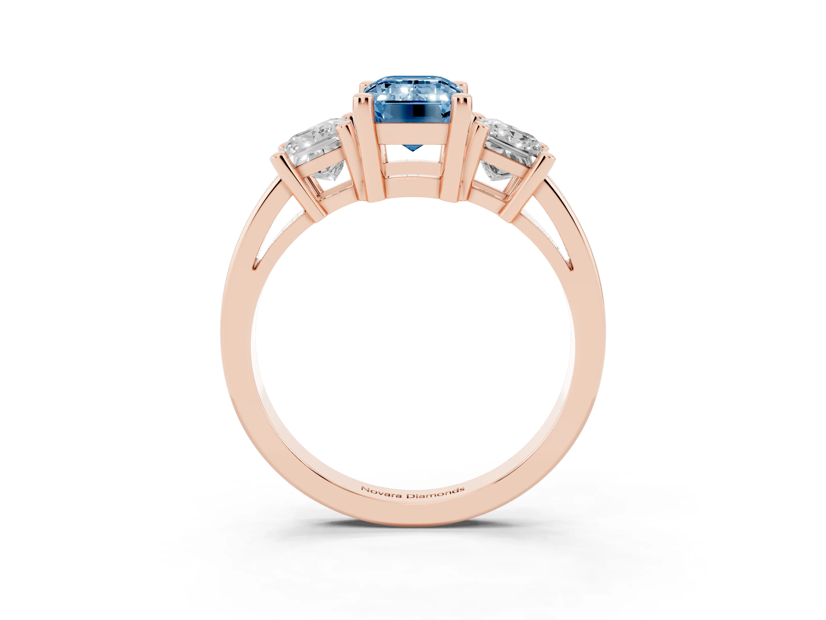 Fancy Blue Three-Stone Emerald Cut Diamond Solitaire Ring Set in Rose gold with Prong Setting