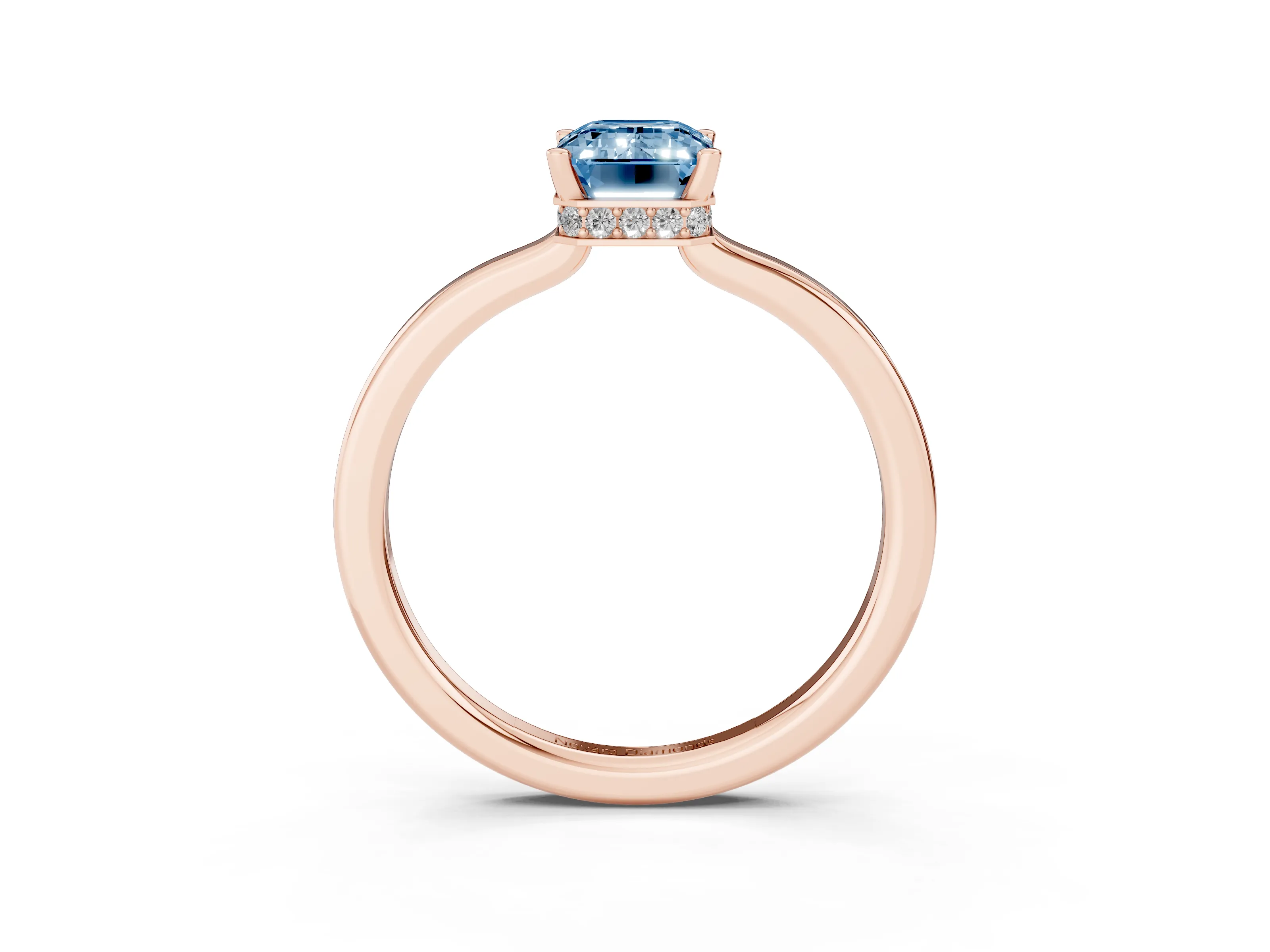 Fancy Blue Emerald Cut Diamond Solitaire Engagement Ring Set in Rose gold with Prong Setting on a Plain Band