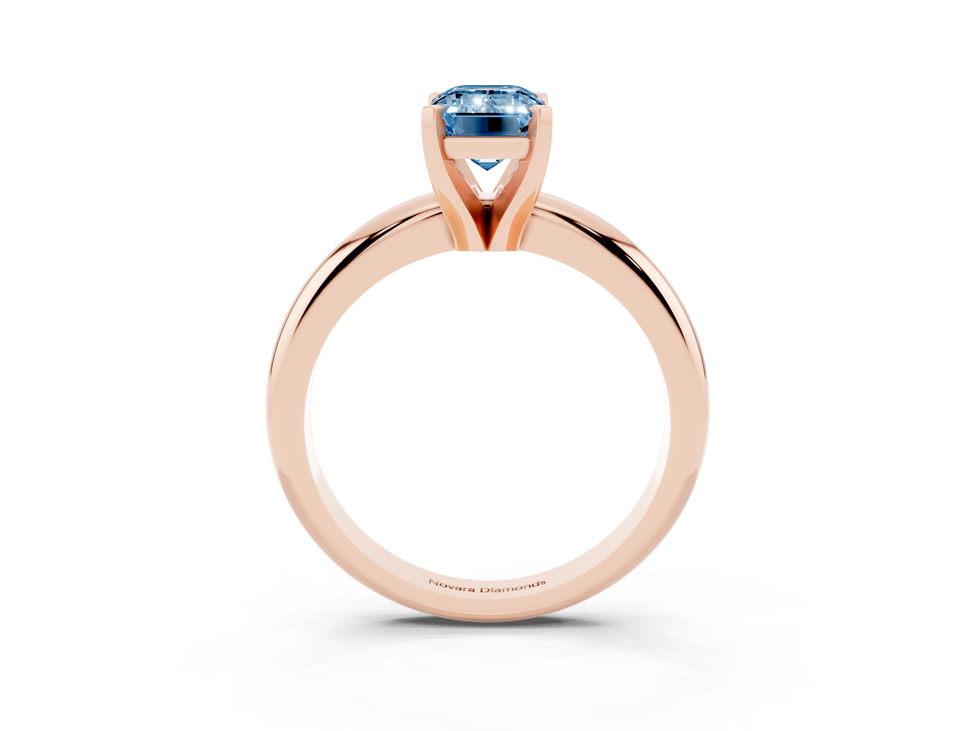 Fancy Blue Emerald Cut Diamond Solitaire Engagement Ring Set in Rose gold with Round Band and Prong Setting
