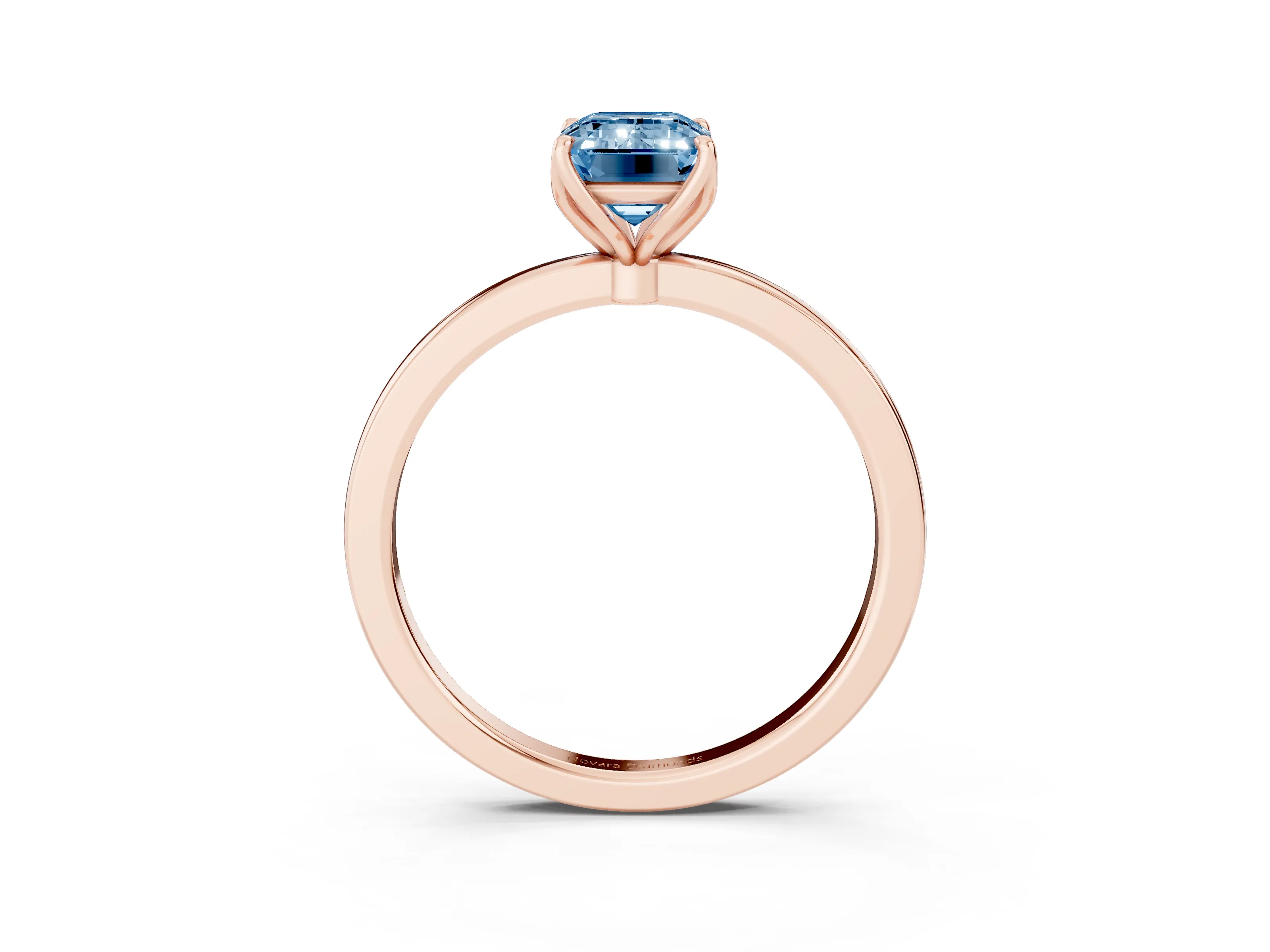 Fancy Blue Emerald Cut Diamond Solitaire Ring Set in Rose gold with Prong Setting and Thin Polished Band