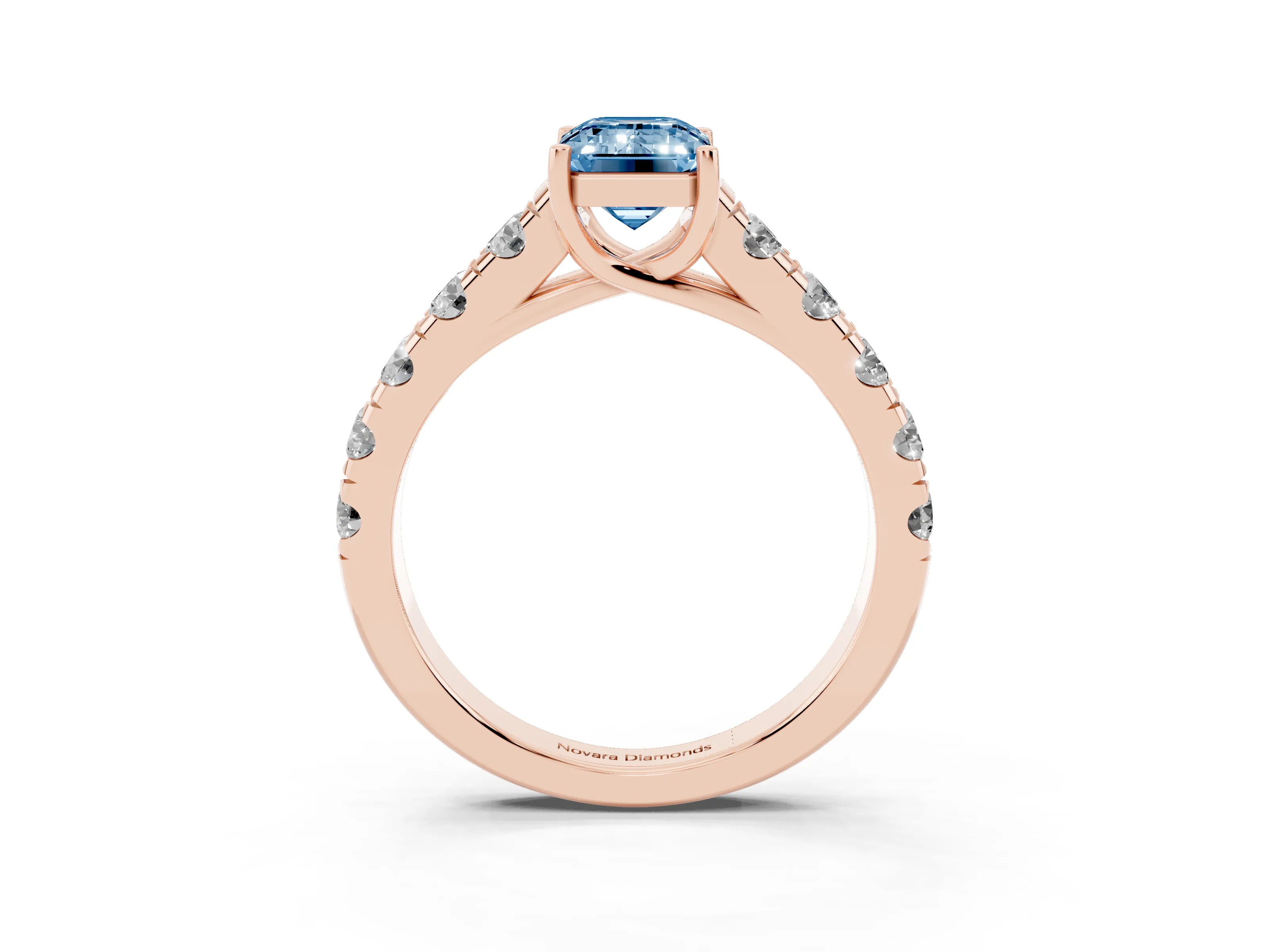 Fancy Blue Emerald Cut Diamond Solitaire Ring Set in Rose gold with Cut-Down Micro Pavé Band and Prong Setting