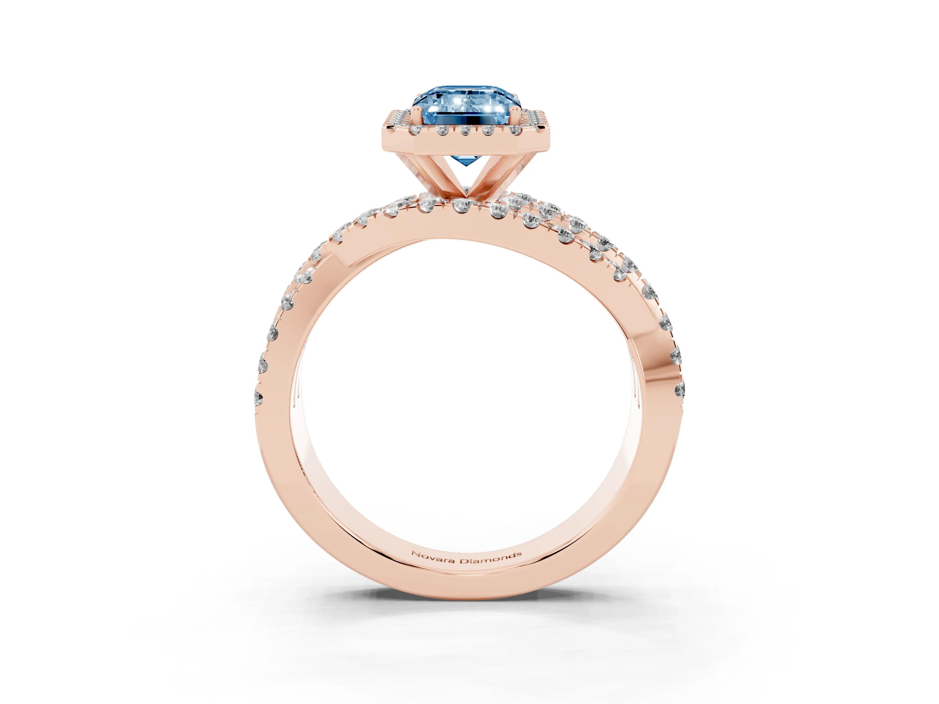 Fancy Blue Emerald Cut Diamond Halo Ring Set in Rose gold with Round Crossover Split Shank and Prong Setting