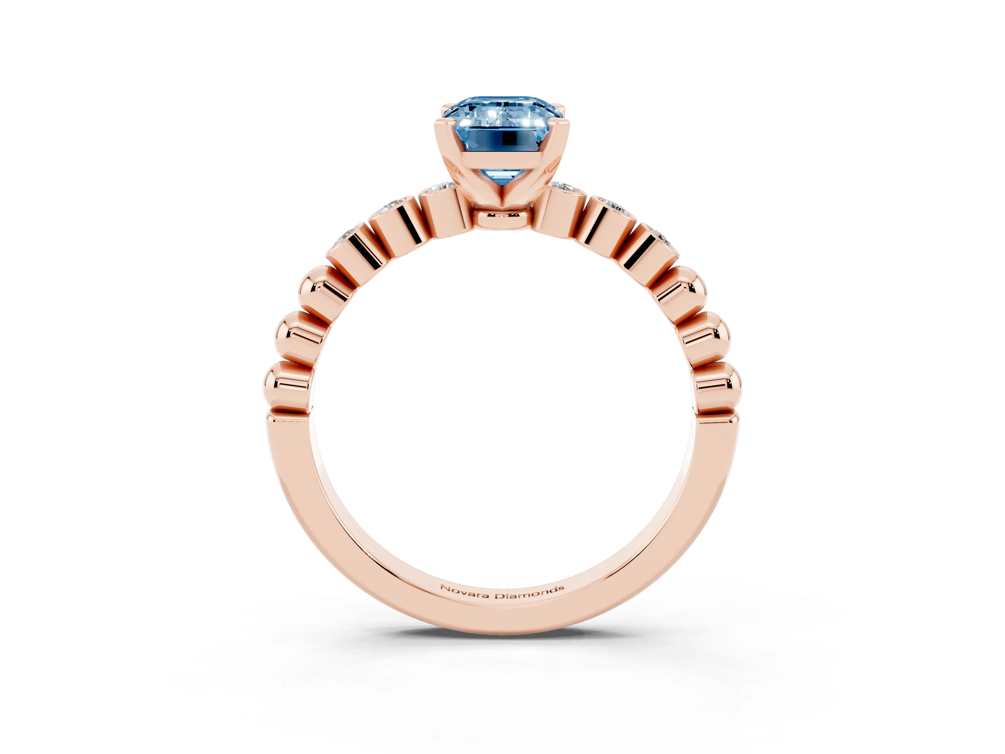Fancy Blue Emerald Cut Diamond Solitaire Engagement Ring Set in Rose gold with Bezel Accents on Beaded Band