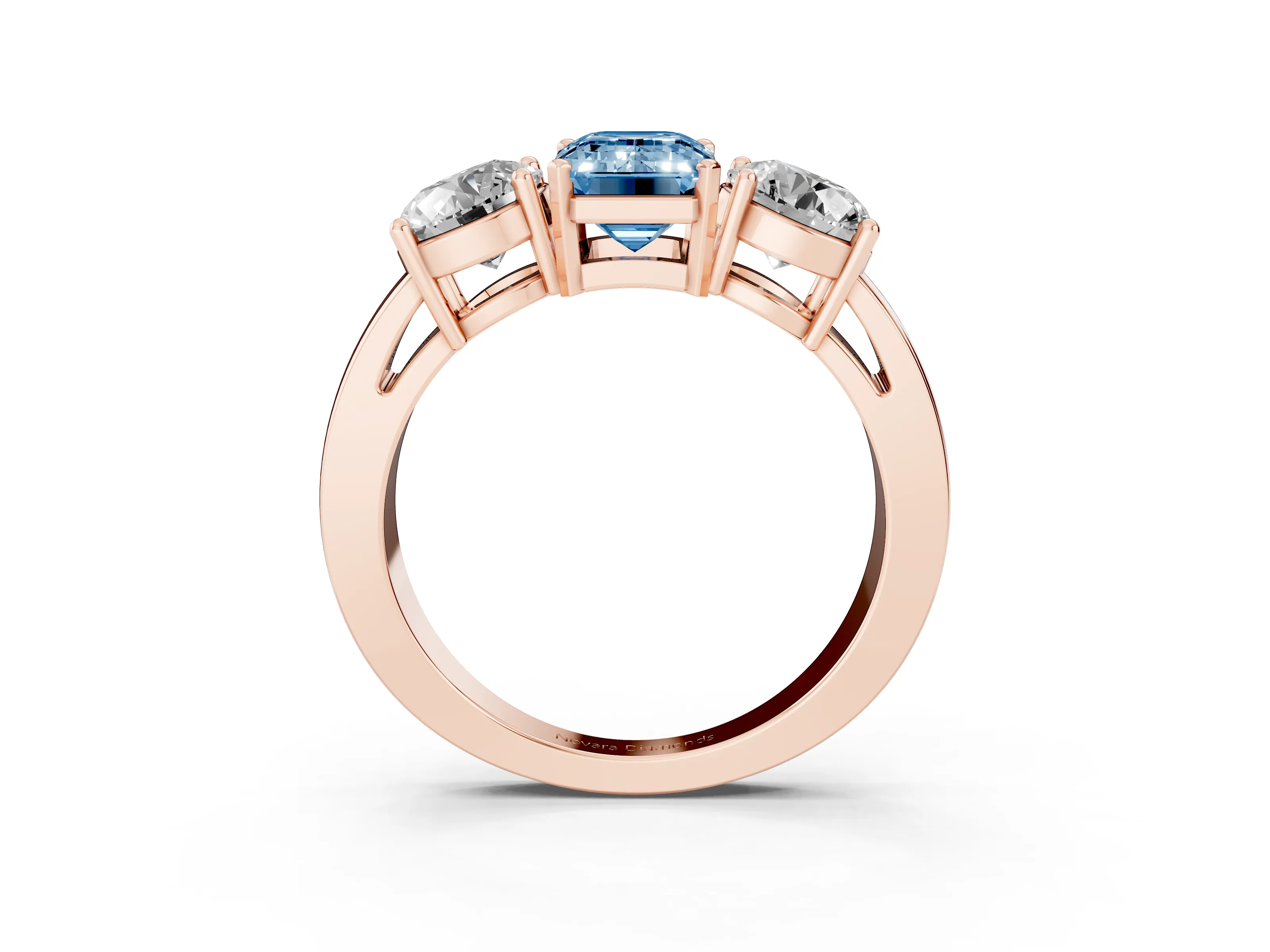 Fancy Blue Emerald Cut Diamond Three-Stone Ring Set in Rose gold with Round Side Stones and Classic Band