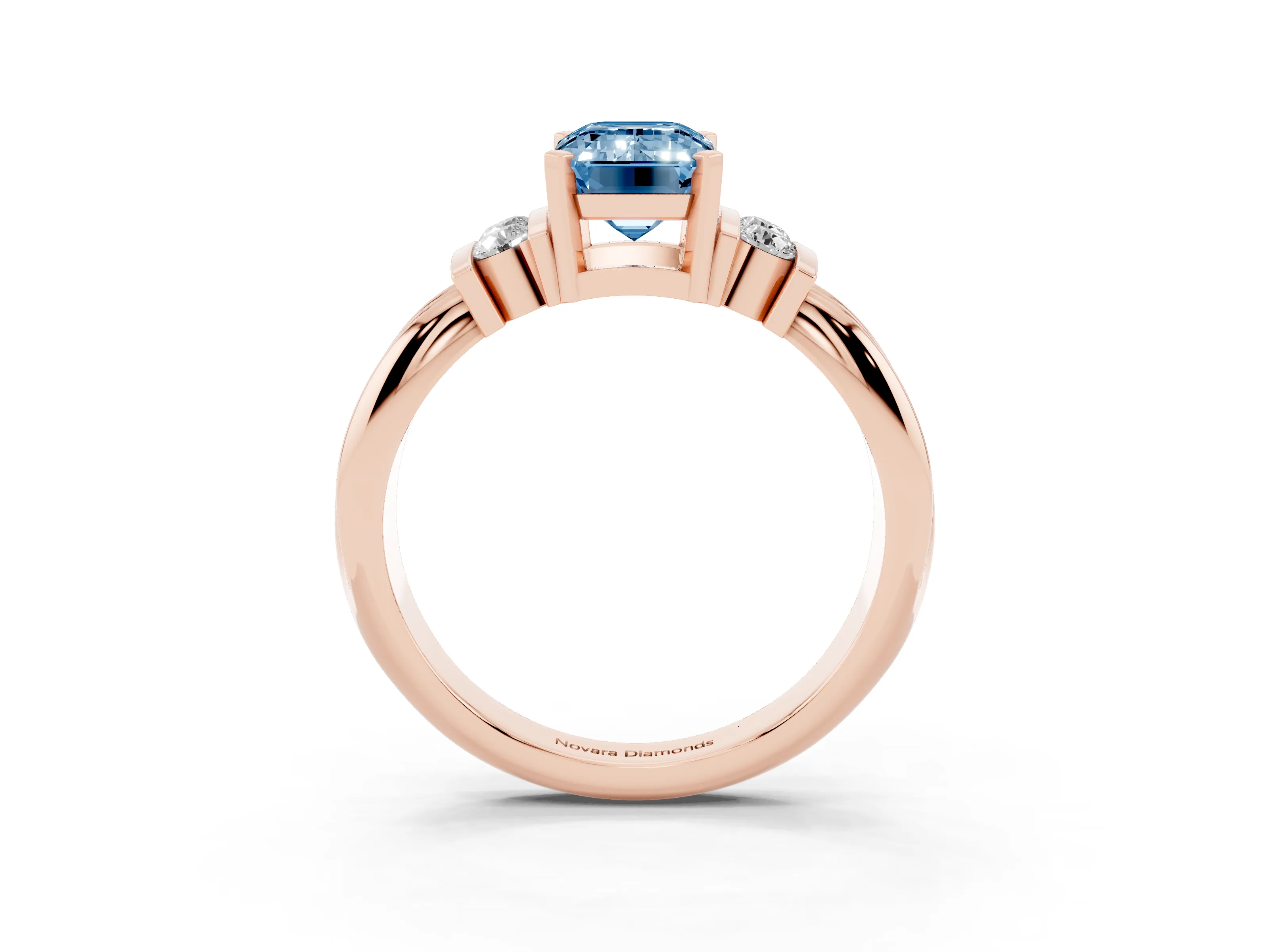 Fancy Blue Three-Stone Emerald Cut Diamond Channel Set Ring Set in Rose gold with Bar Prongs