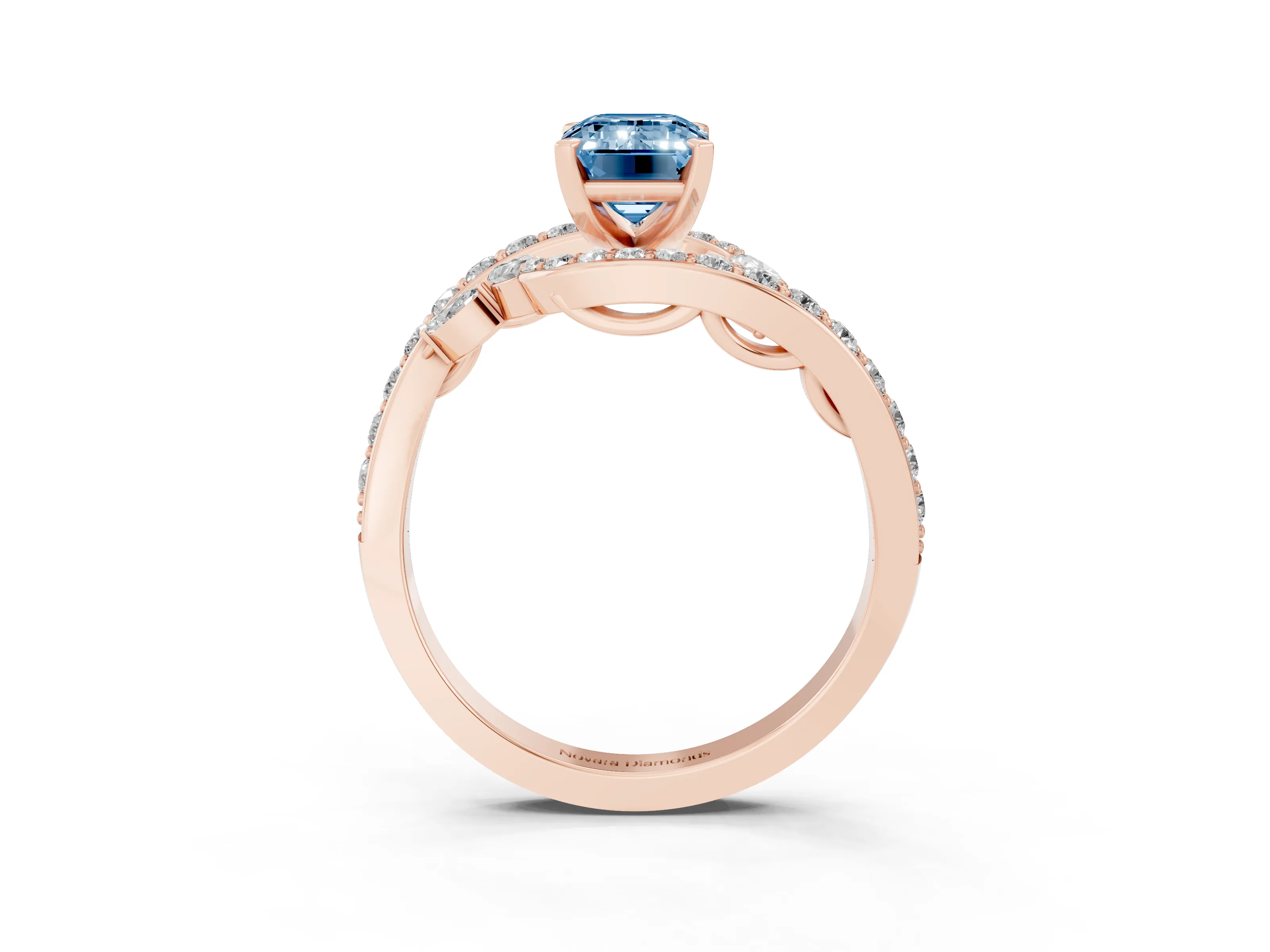 Fancy Blue Emerald Cut Diamond Solitaire Ring Set in Rose gold with Pavé Twist Band and Secure Prong Setting
