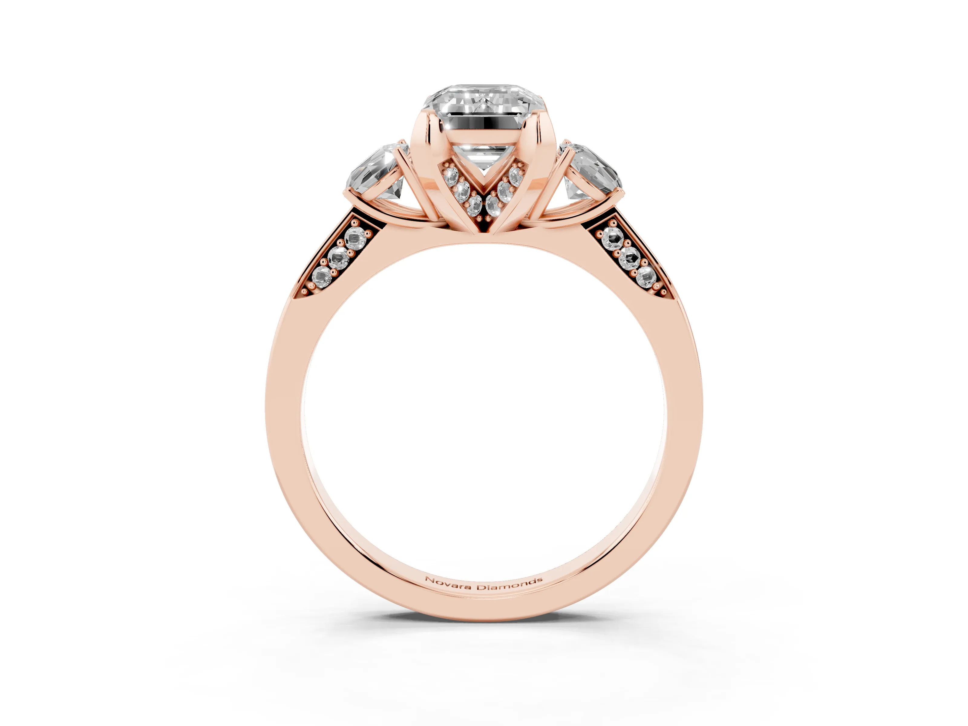 Fancy Blue Emerald Cut Diamond Three-Stone Ring Set in Rose gold with Pavé Band and Smaller Side Stones
