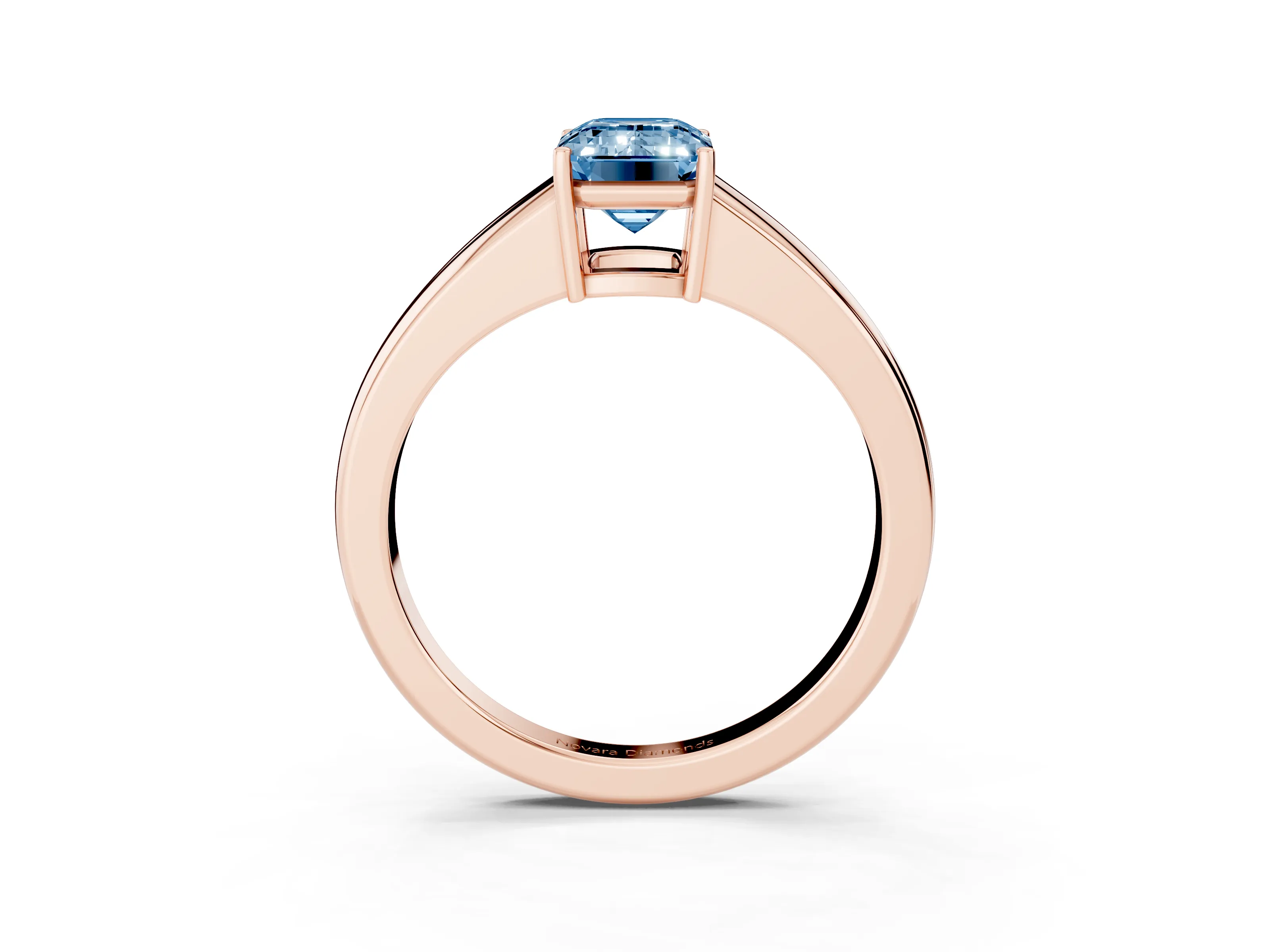 Fancy Blue Emerald Cut Diamond Solitaire Ring Set in Rose gold with Tapered Band and Prong Setting