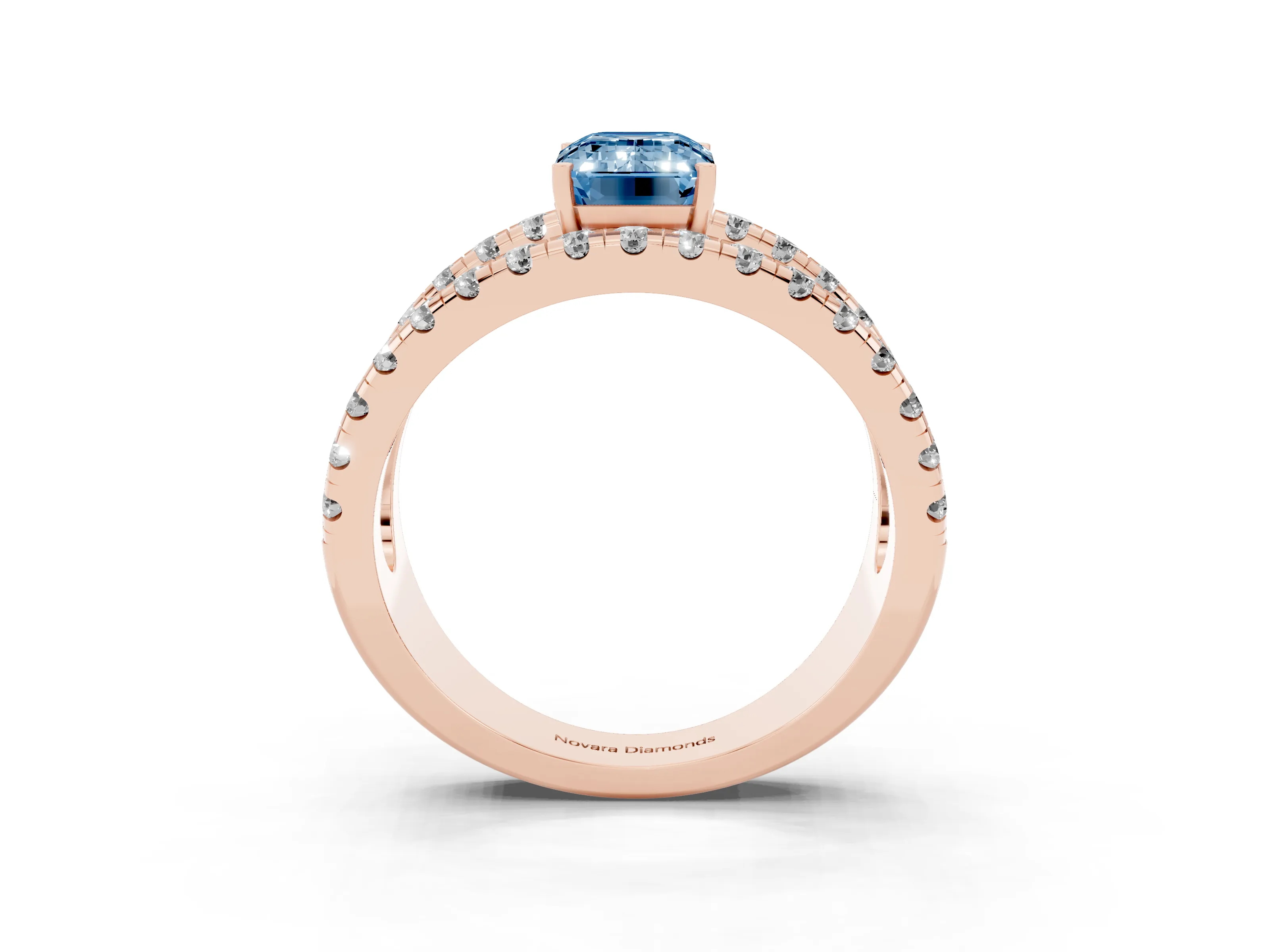 Fancy Blue Emerald Cut Diamond Split Shank Pavé Solitaire Ring Set in Rose gold with Open Shank Design
