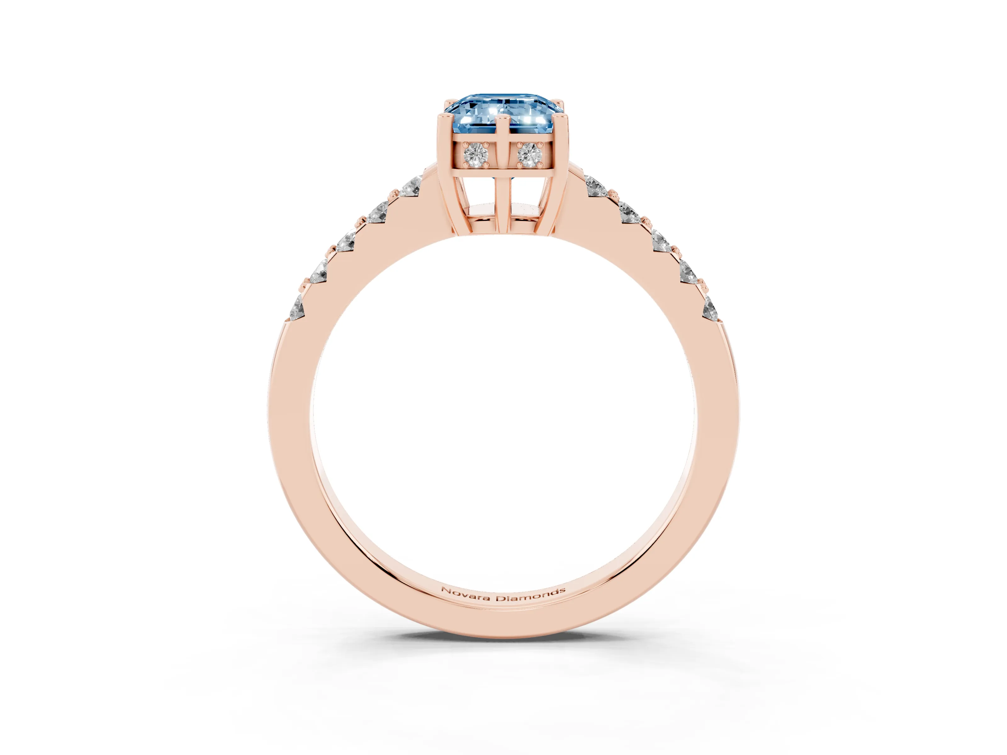 Fancy Blue Emerald Cut Diamond Solitaire Engagement Ring Set in Rose gold with Pavé Band and Prong Setting