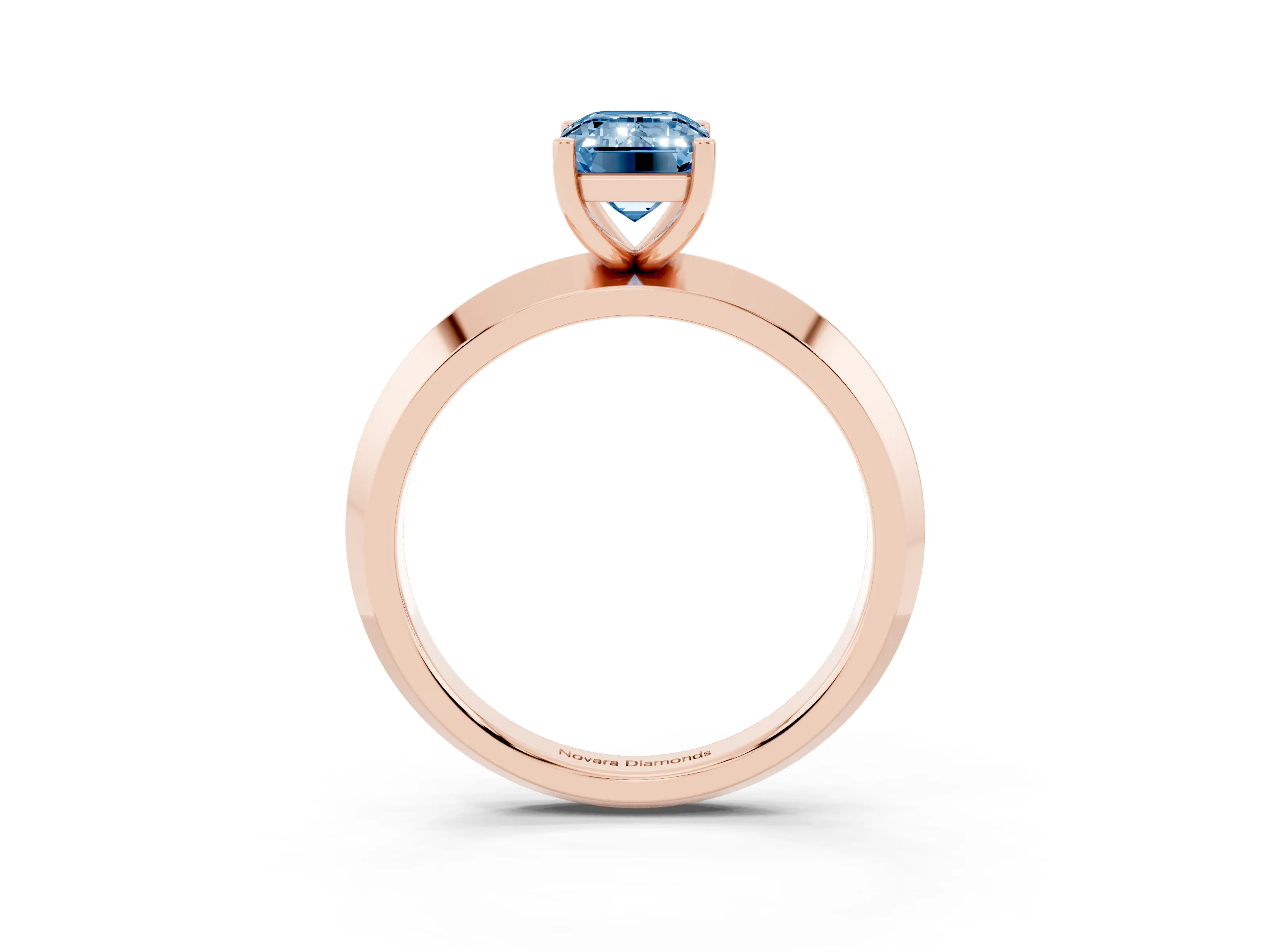 Fancy Blue Emerald Cut Diamond Solitaire Engagement Ring Set in Rose gold with Flat Band and Prong Setting