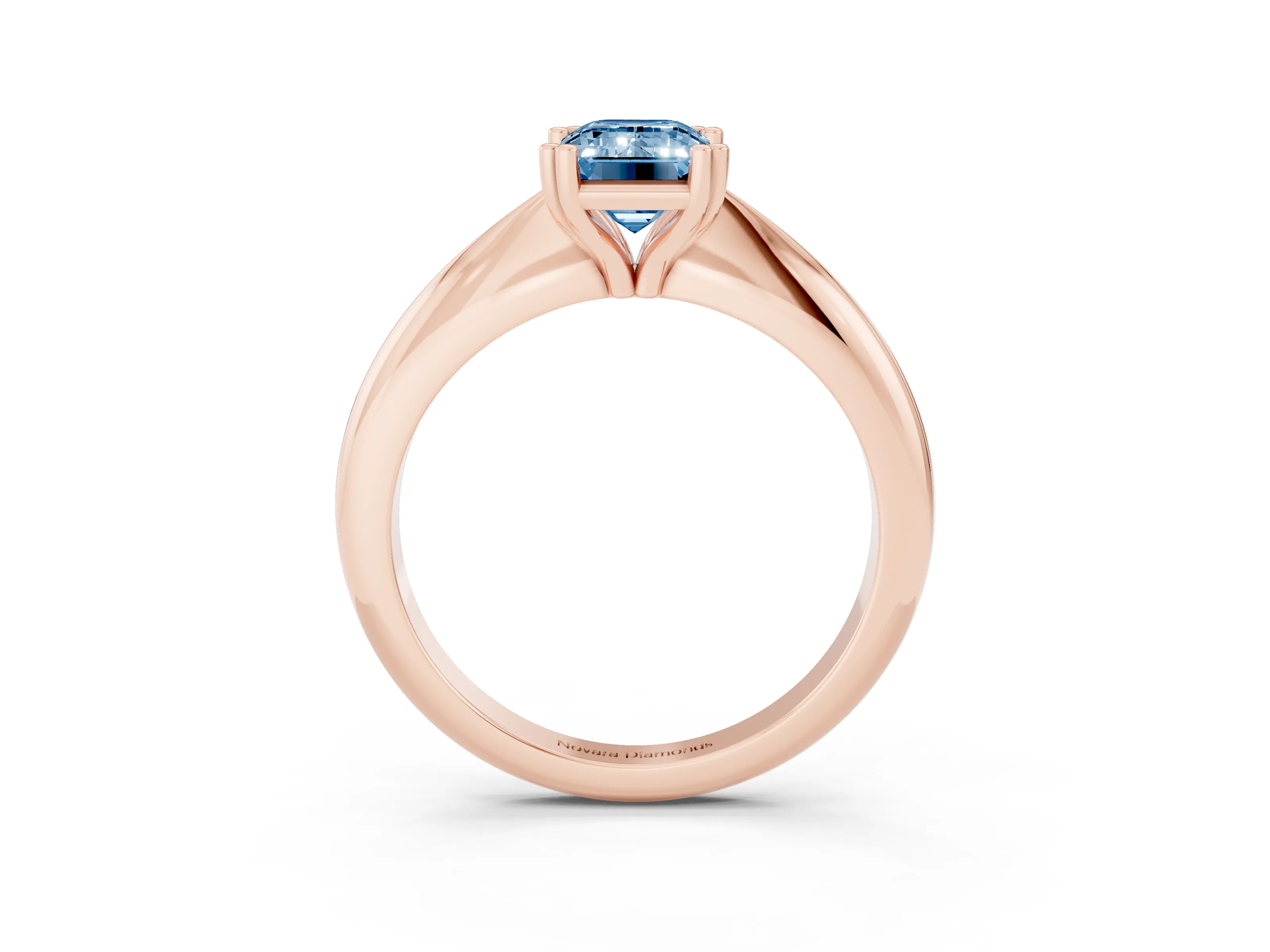 Fancy Blue Emerald Cut Diamond Solitaire Engagement Ring Set in Rose gold with Tapered Band and Prong Setting