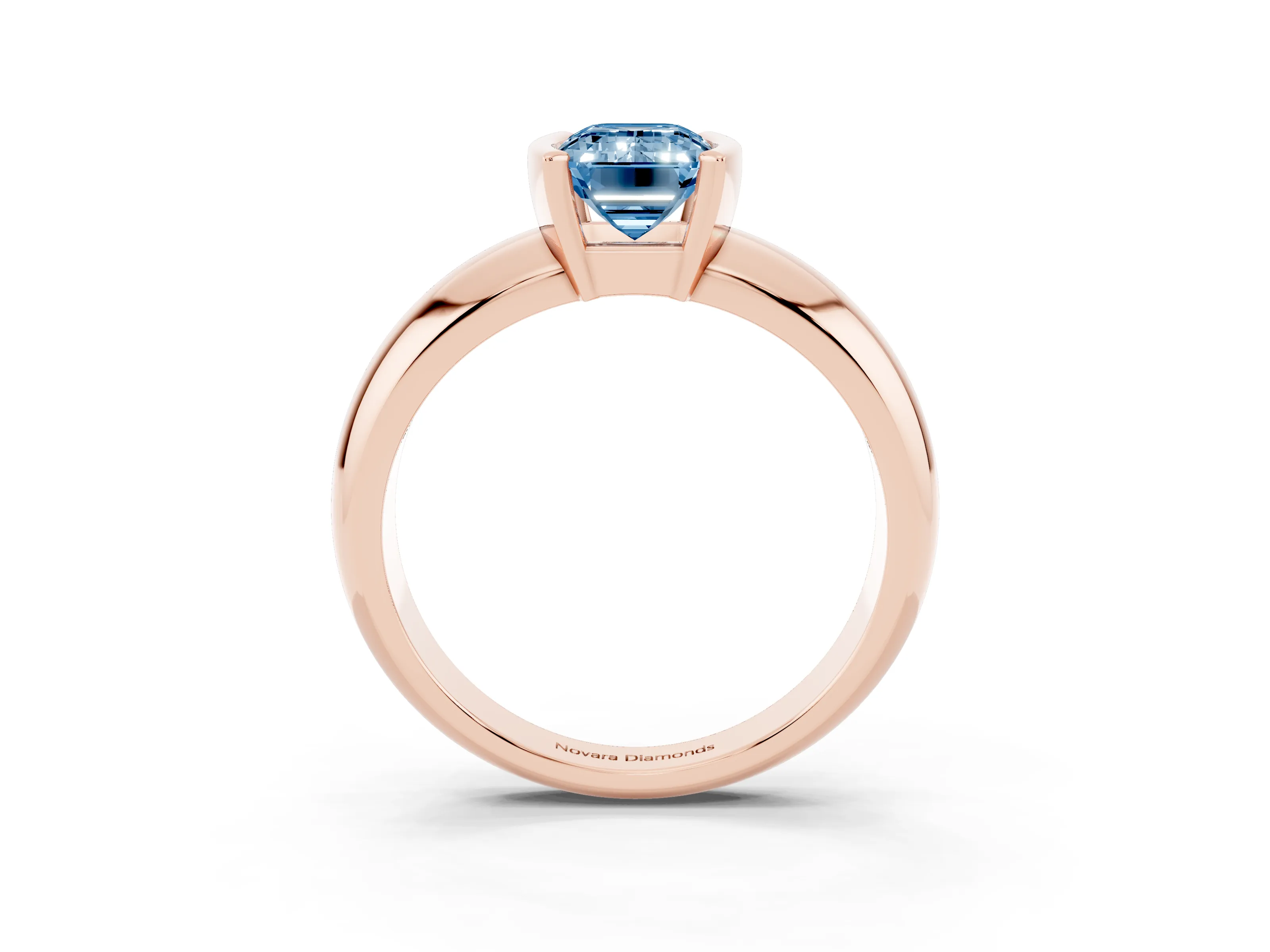 Fancy Blue Emerald Cut Diamond Solitaire Tension Set Ring Set in Rose gold with Wide Band