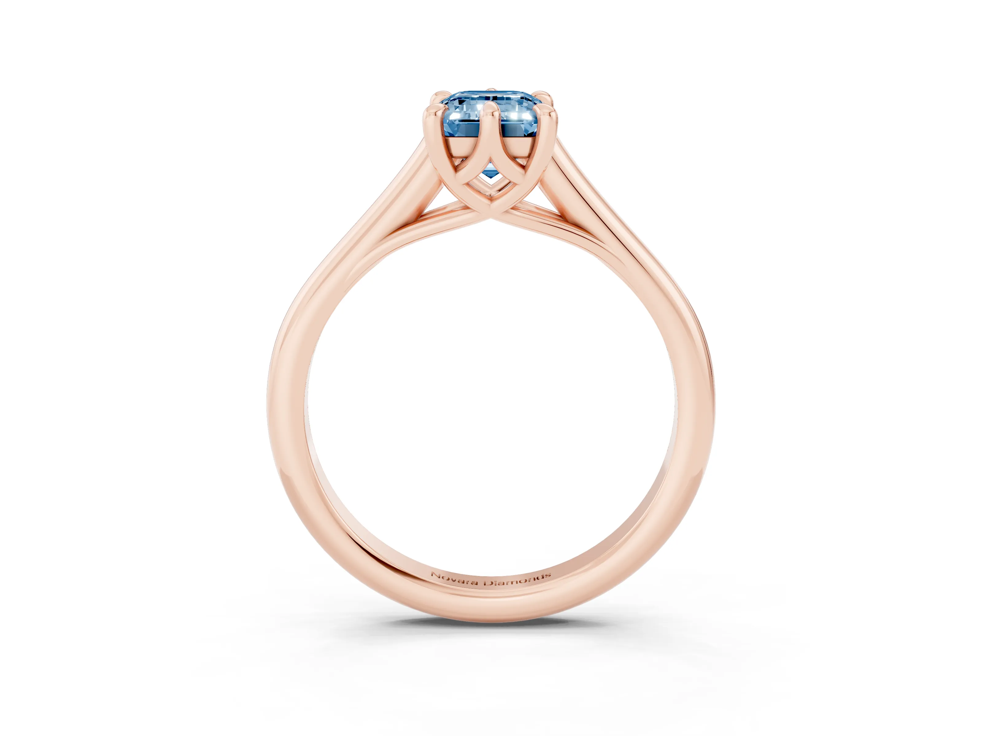 Fancy Blue Emerald Cut Diamond Solitaire Engagement Ring Set in Rose gold with Prong Setting and Plain Classic Band