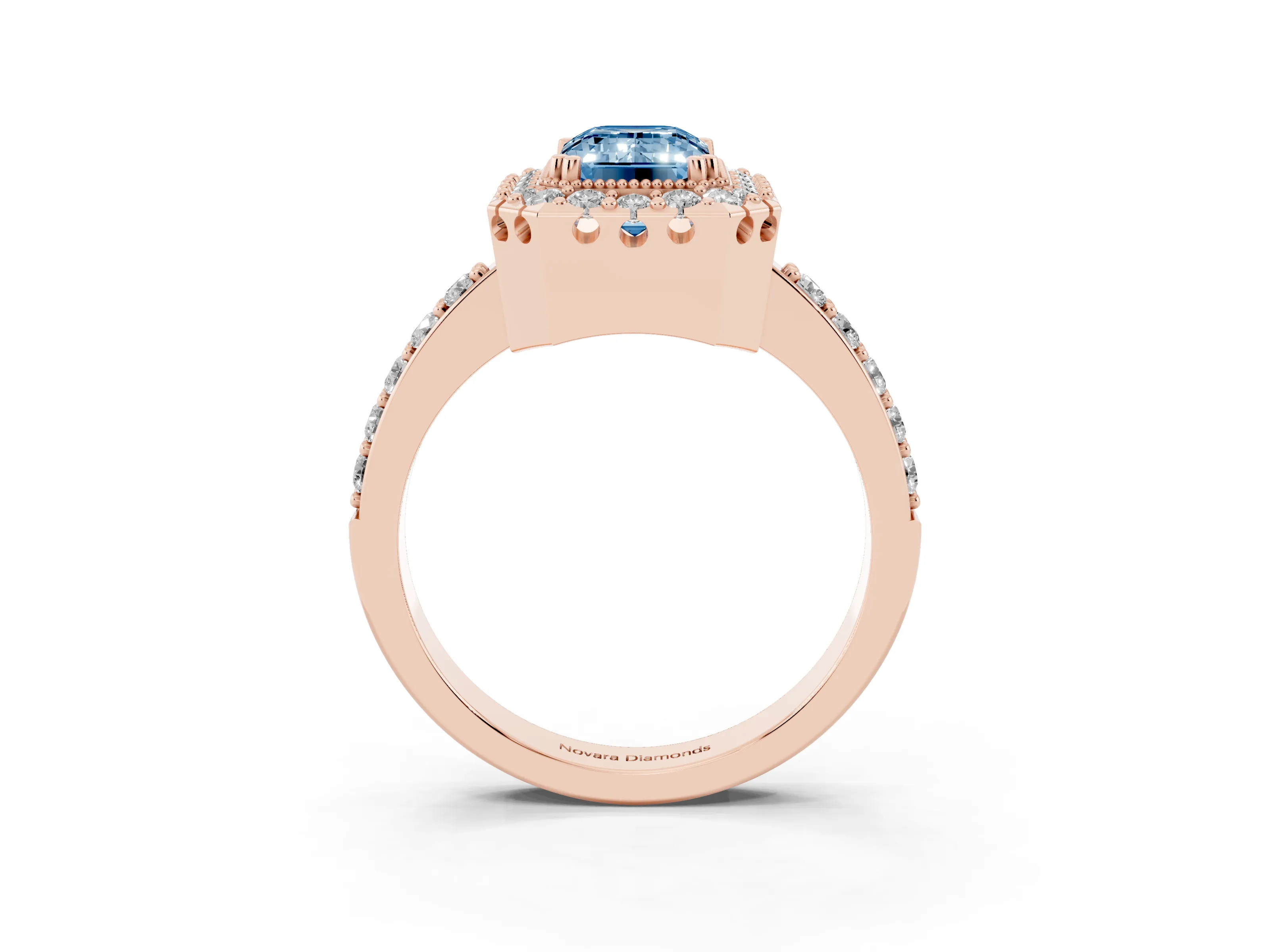 Fancy Blue Emerald Cut Diamond Halo Ring Set in Rose gold with Pavé Shank and Prong Setting