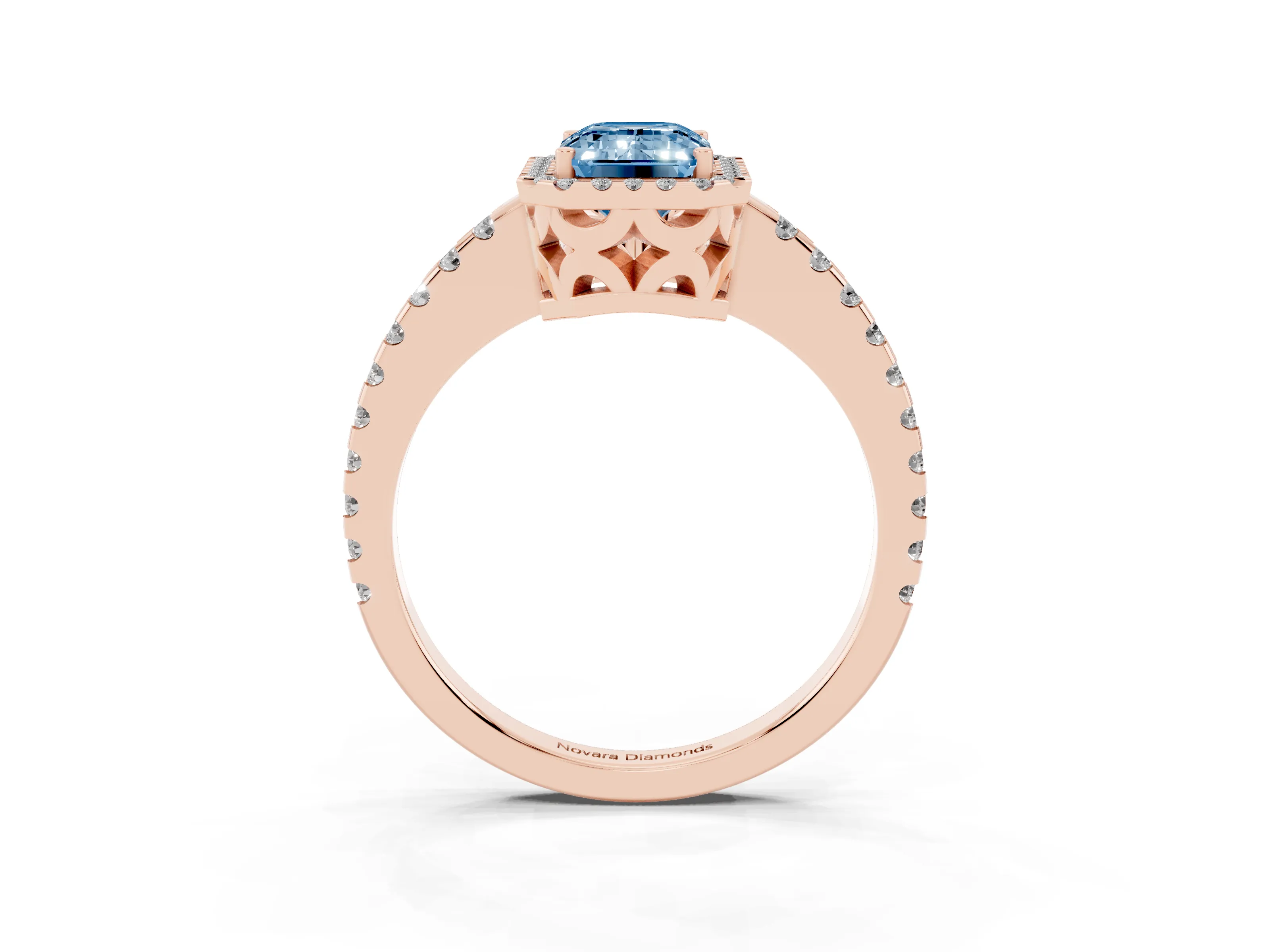 Fancy Blue Emerald Cut Diamond Halo Ring Set in Rose gold with Pavé Shoulders and Halo-Framed Center