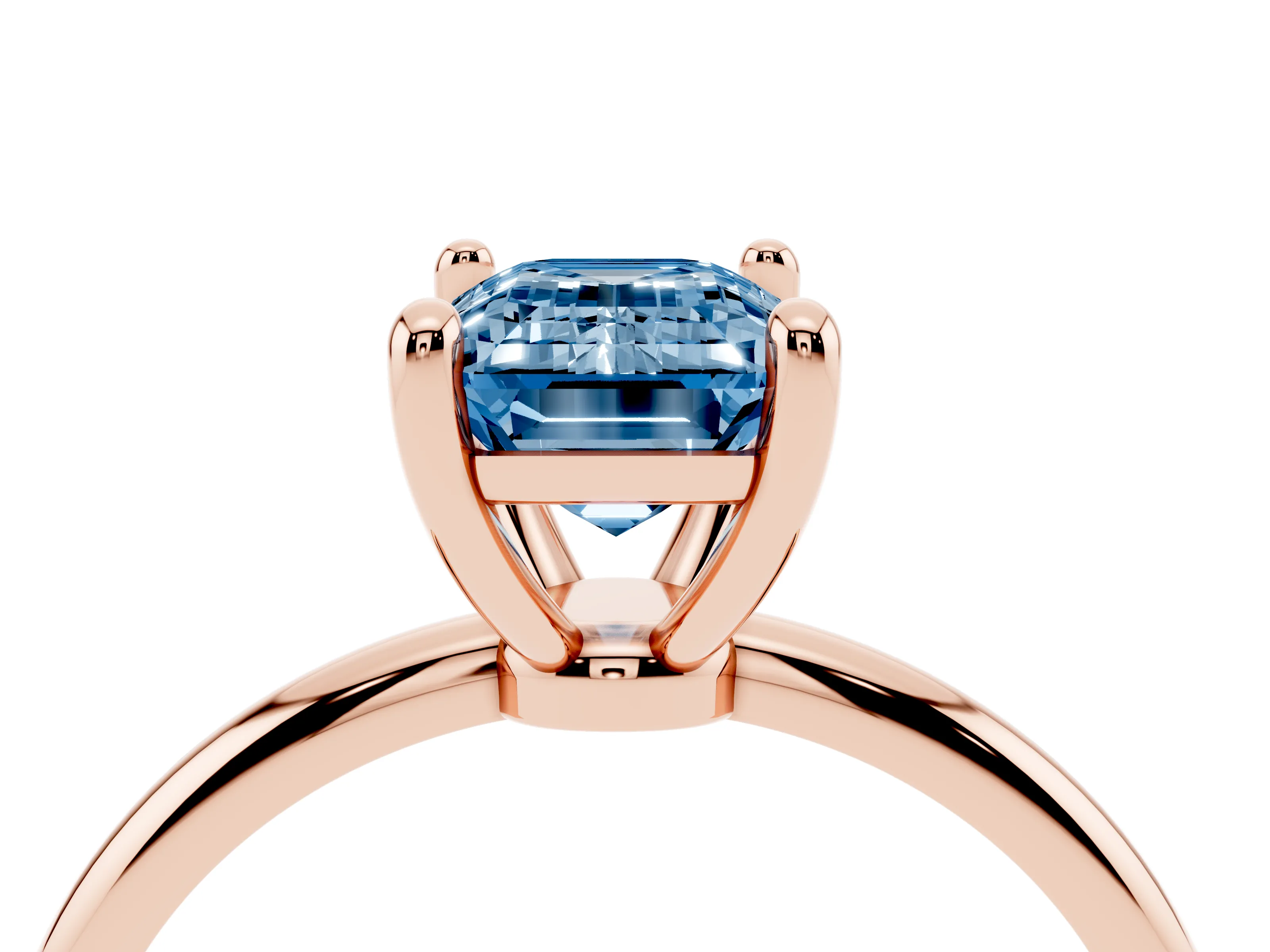 Fancy Blue Emerald Cut Diamond Solitaire Ring Set in Rose gold with Secure Prong Setting on a Classic Band