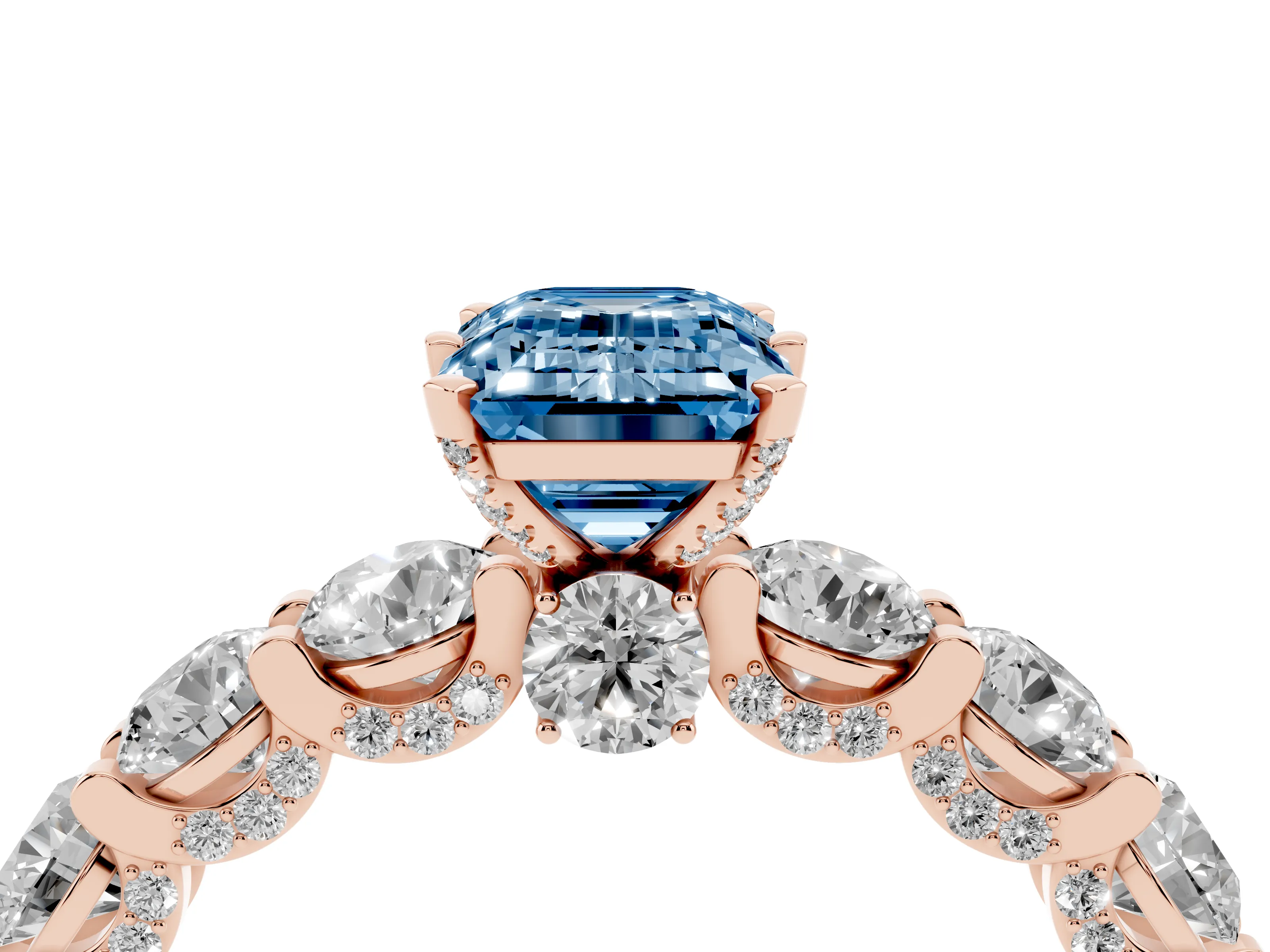 Fancy Blue Emerald Cut Diamond Side Stone Ring Set in Rose gold with Alternating Round and Oval Side Stones