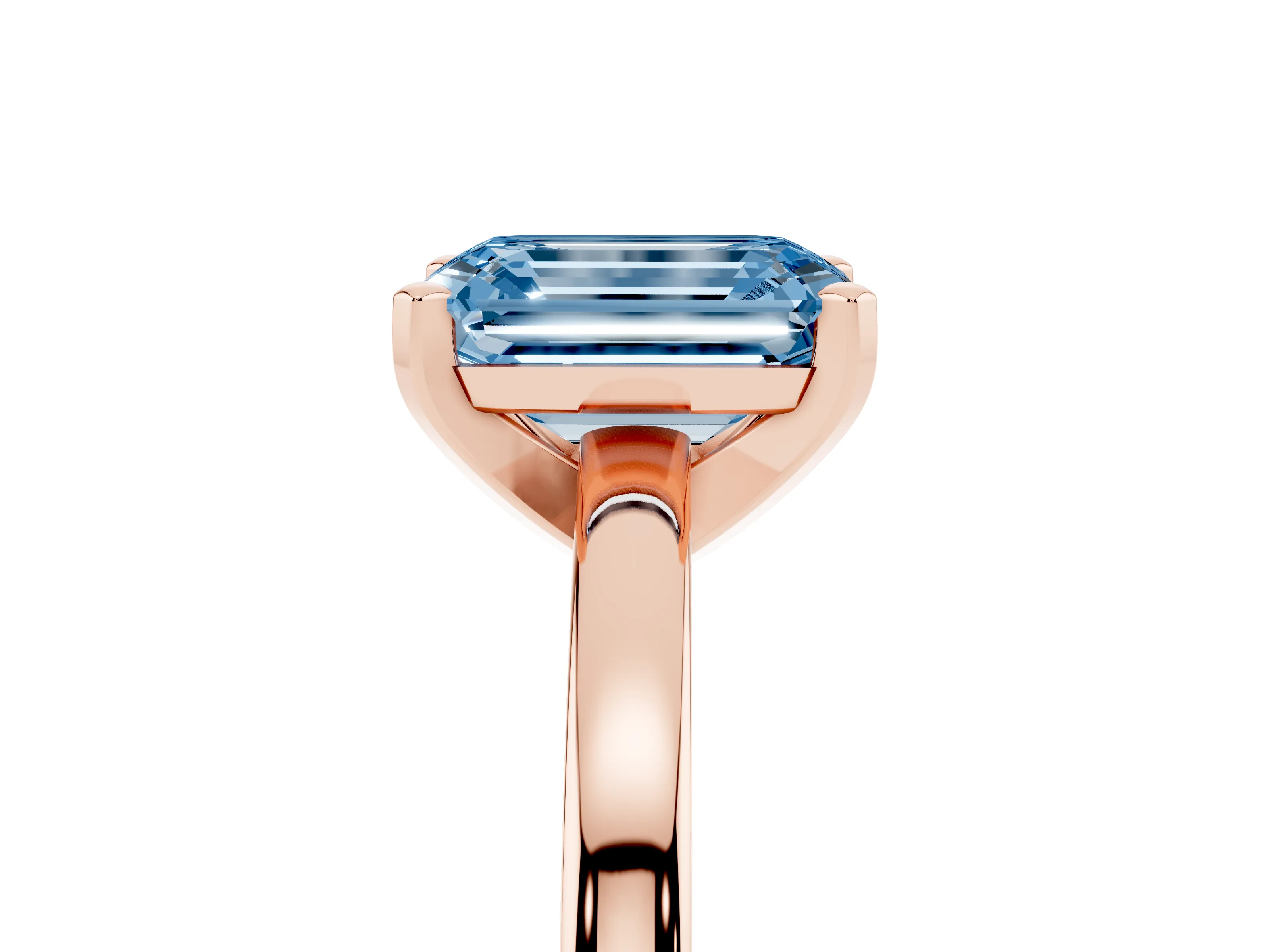 Fancy Blue Emerald Cut Diamond Solitaire Engagement Ring Set in Rose gold with Prong Setting on a Classic Band